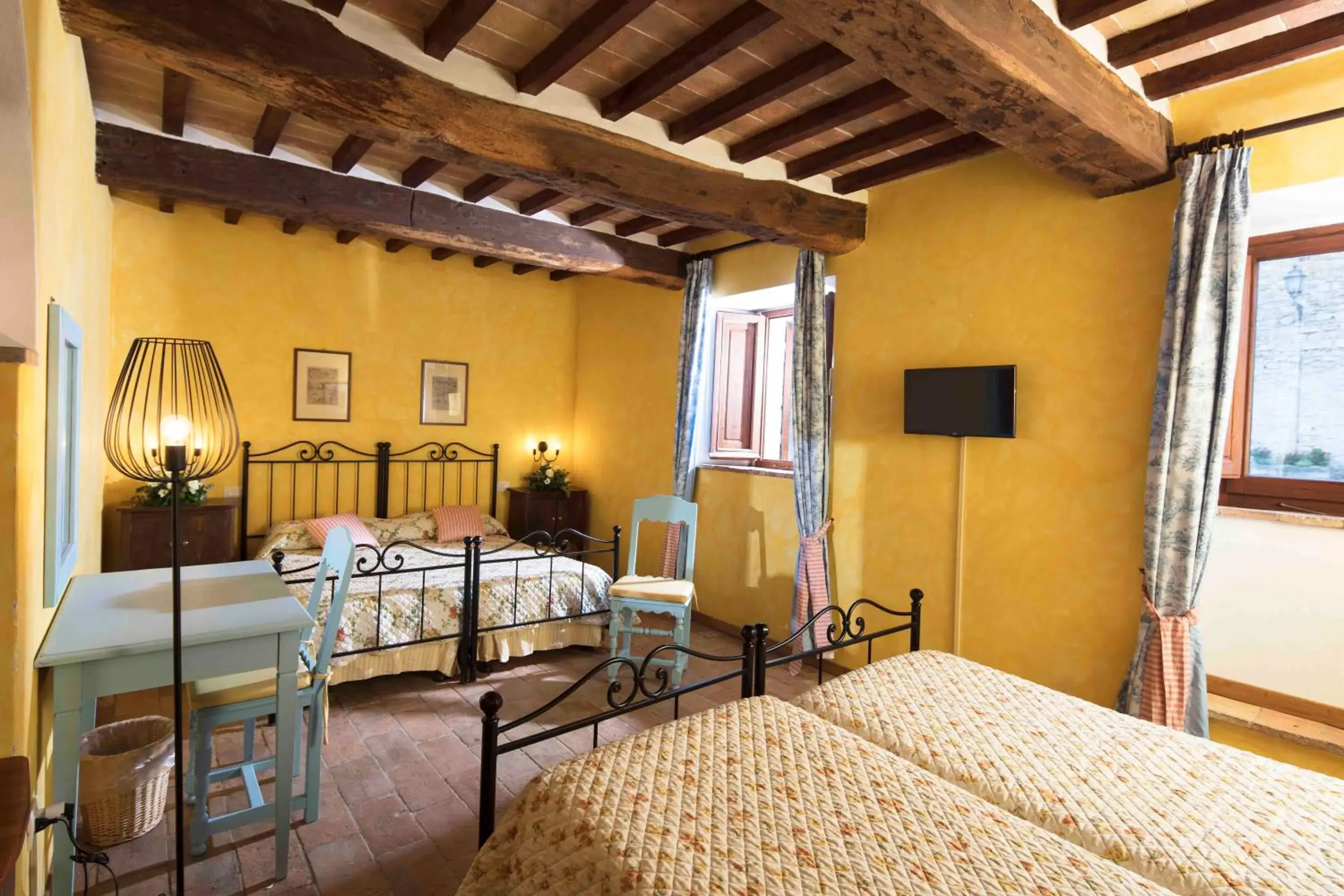 Photo of the whole room, Bed in Castello di Titignano Photo of the whole room, Bed in Castello di Titignano