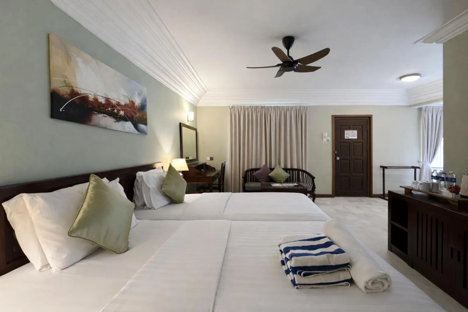 Bed in Frangipani Langkawi Resort