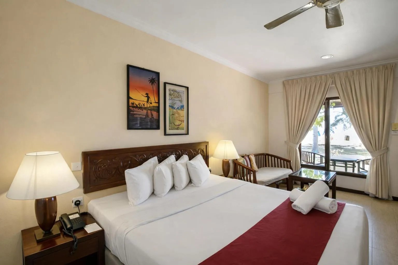 Bed in Frangipani Langkawi Resort