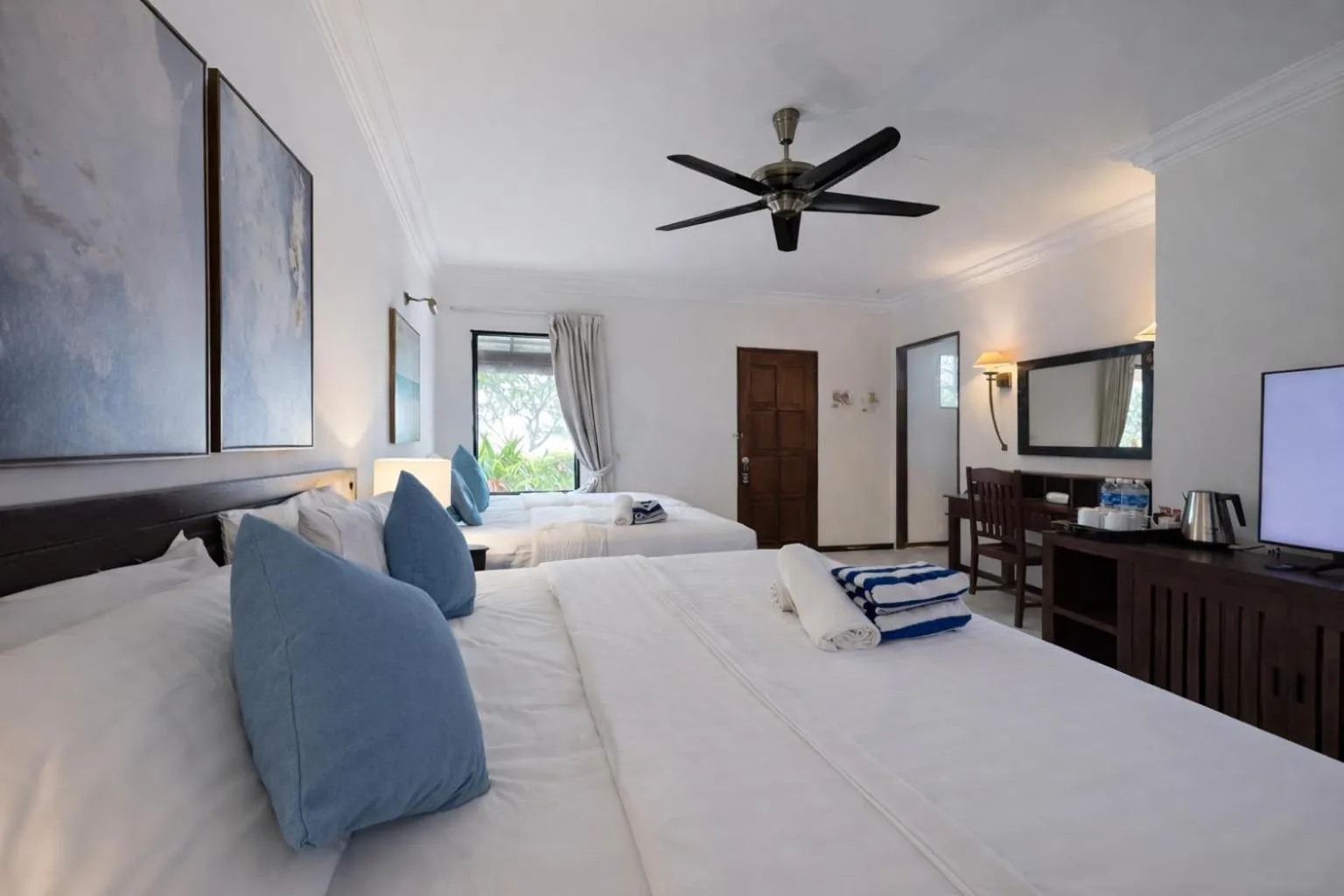 Bed in Frangipani Langkawi Resort