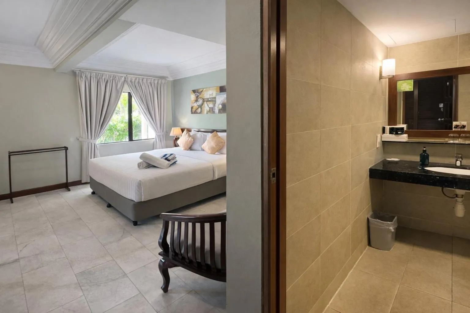 Bed in Frangipani Langkawi Resort