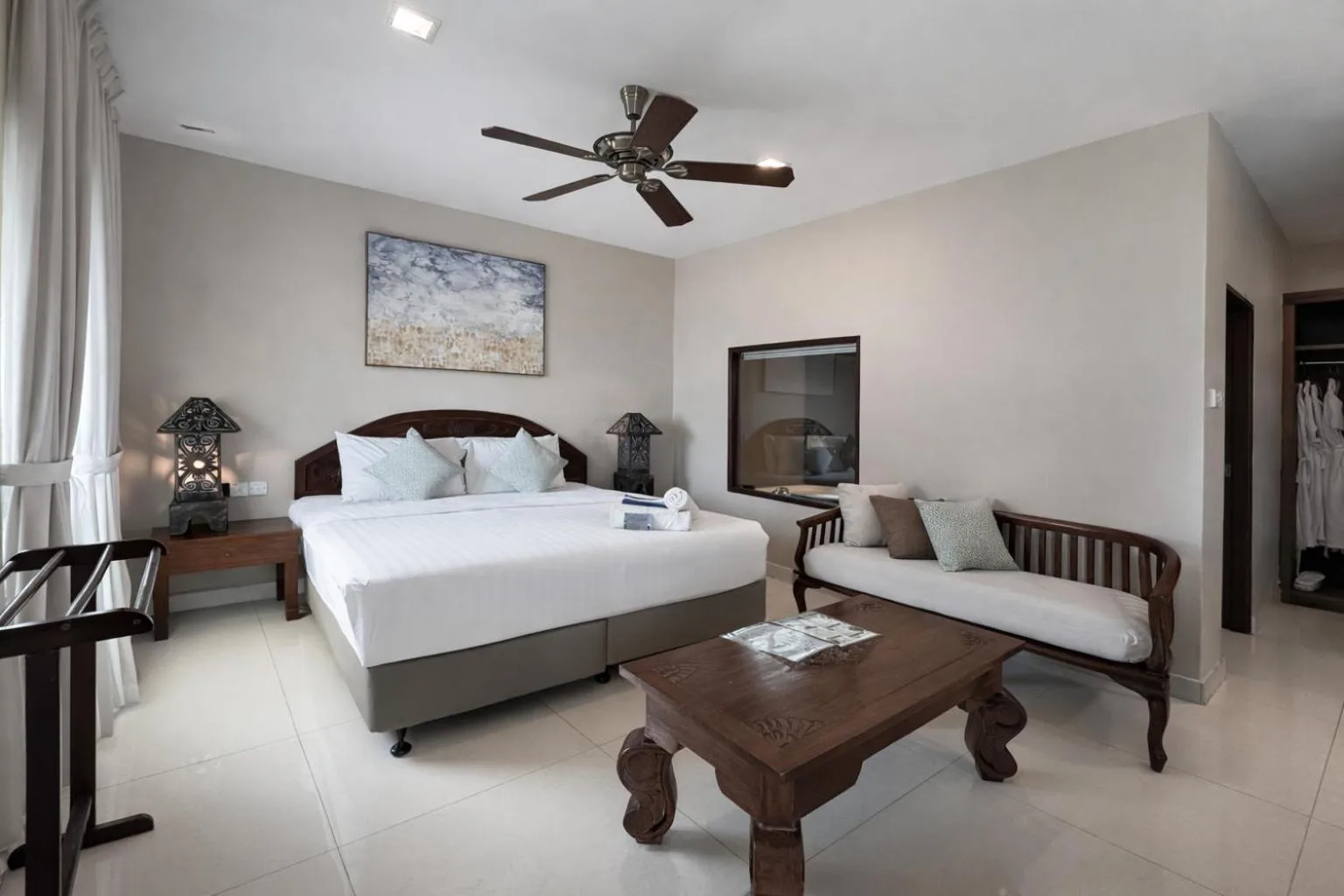 Bed in Frangipani Langkawi Resort