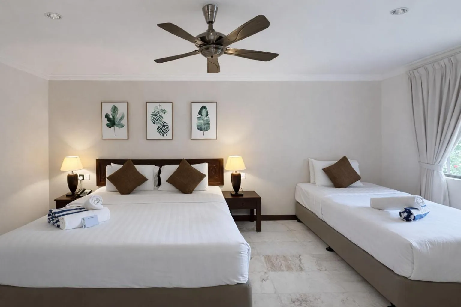 Bed in Frangipani Langkawi Resort