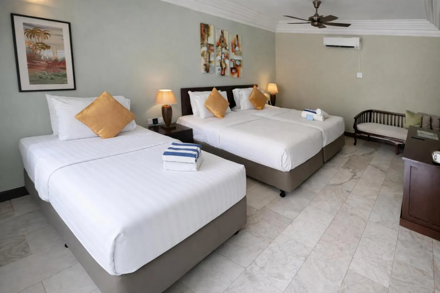 Bed in Frangipani Langkawi Resort