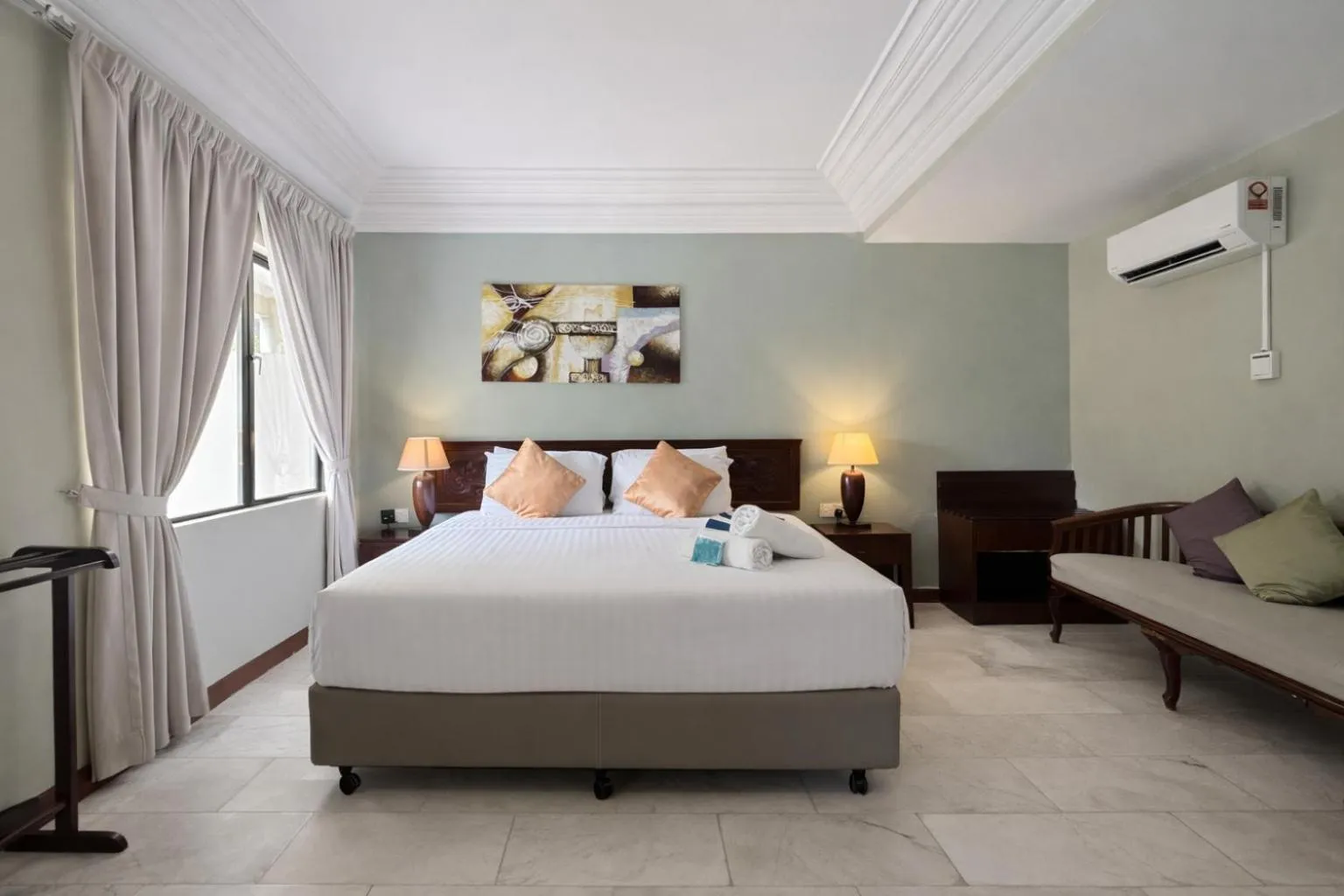 Bed in Frangipani Langkawi Resort