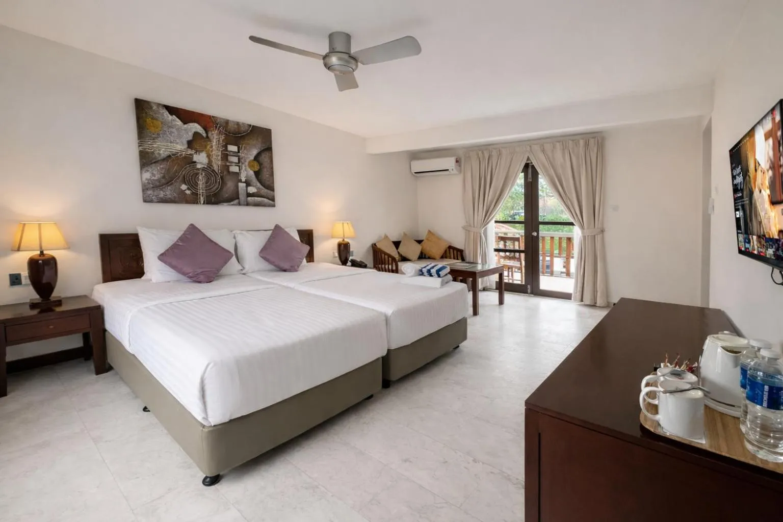 Bed in Frangipani Langkawi Resort