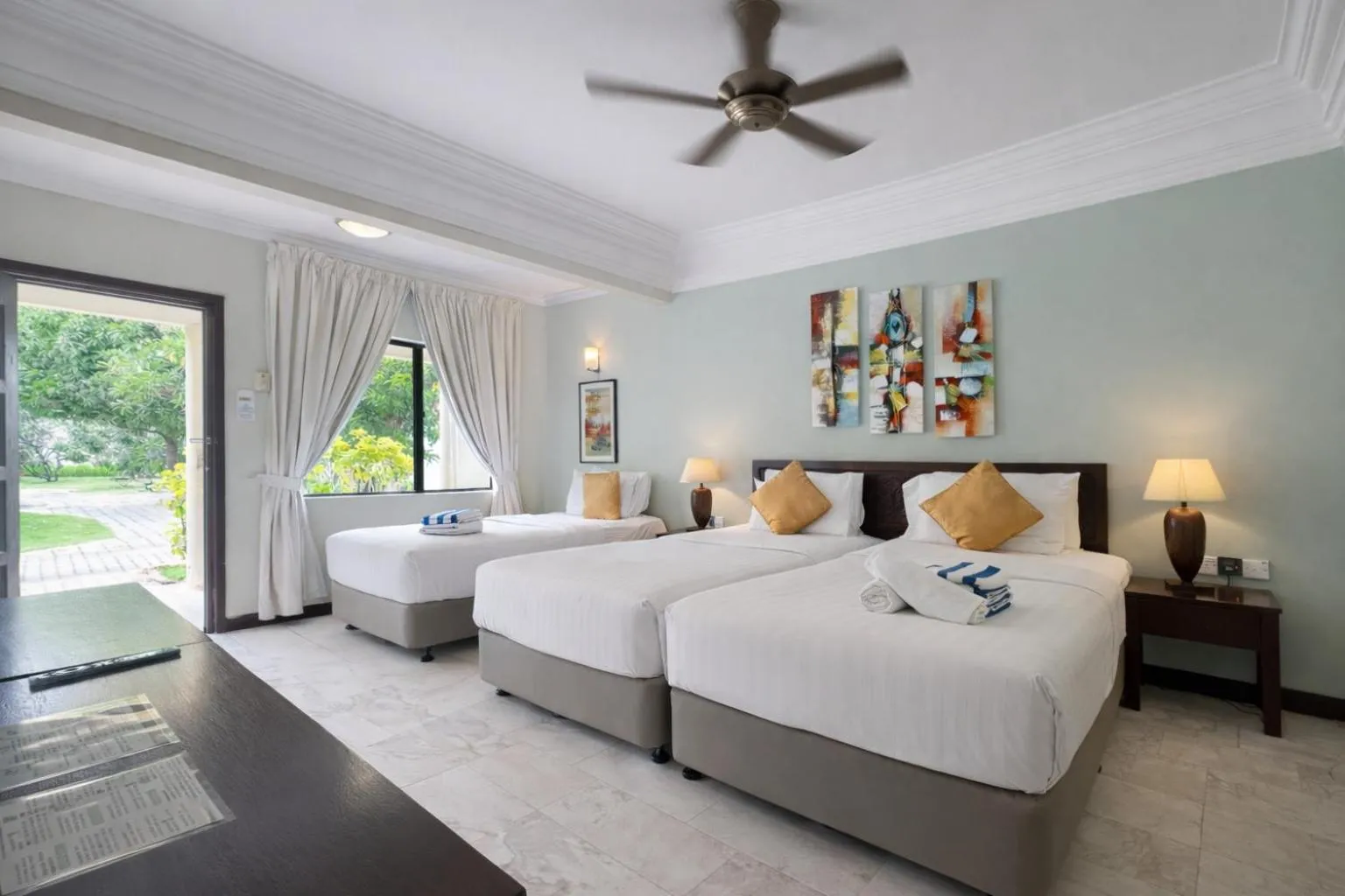 Bed in Frangipani Langkawi Resort