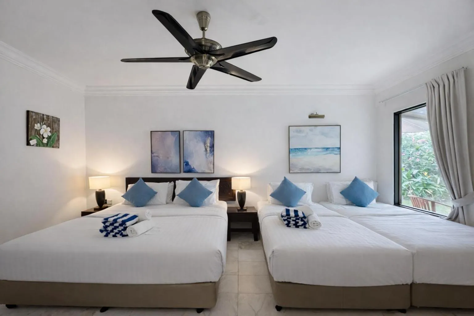 Bed in Frangipani Langkawi Resort