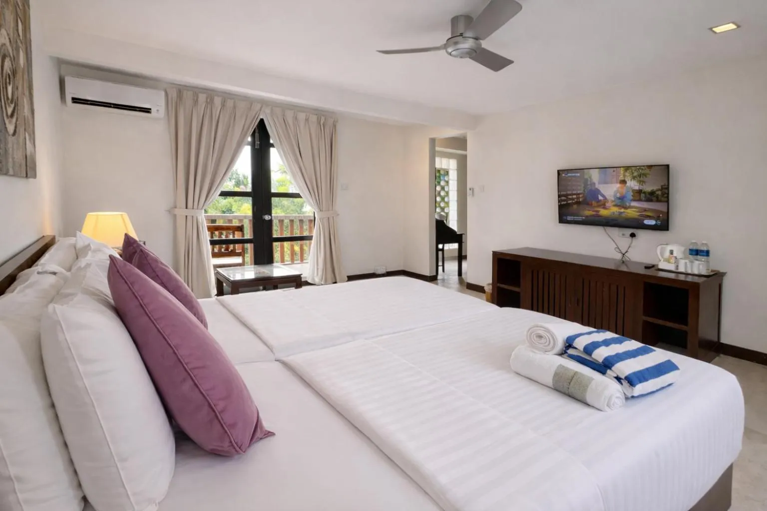 Bed in Frangipani Langkawi Resort