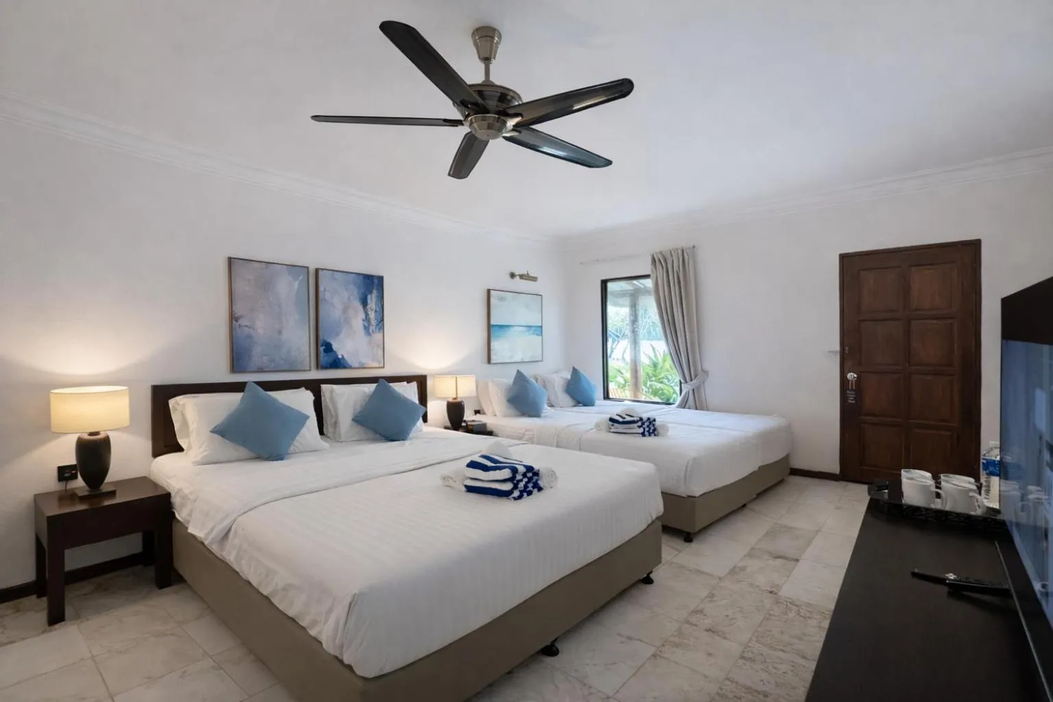 Bed in Frangipani Langkawi Resort