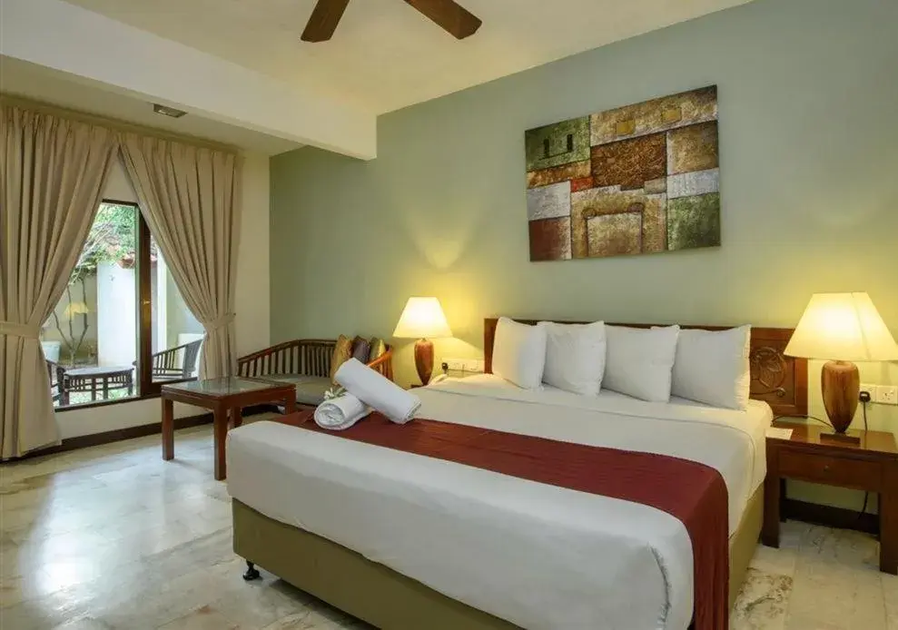 Bed in Frangipani Langkawi Resort Bed in Frangipani Langkawi Resort