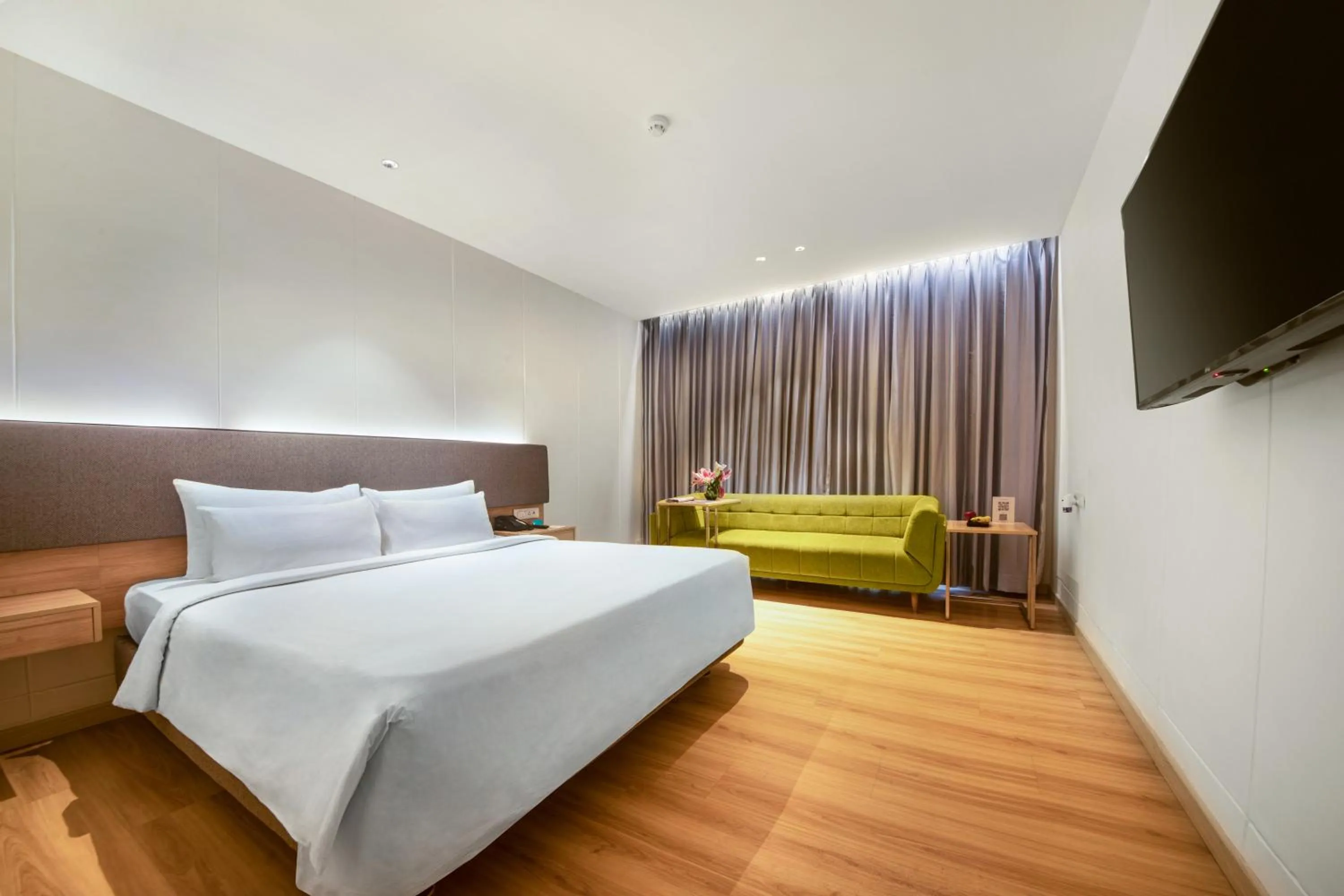 Seating area, Bed in Greenpark Hyderabad