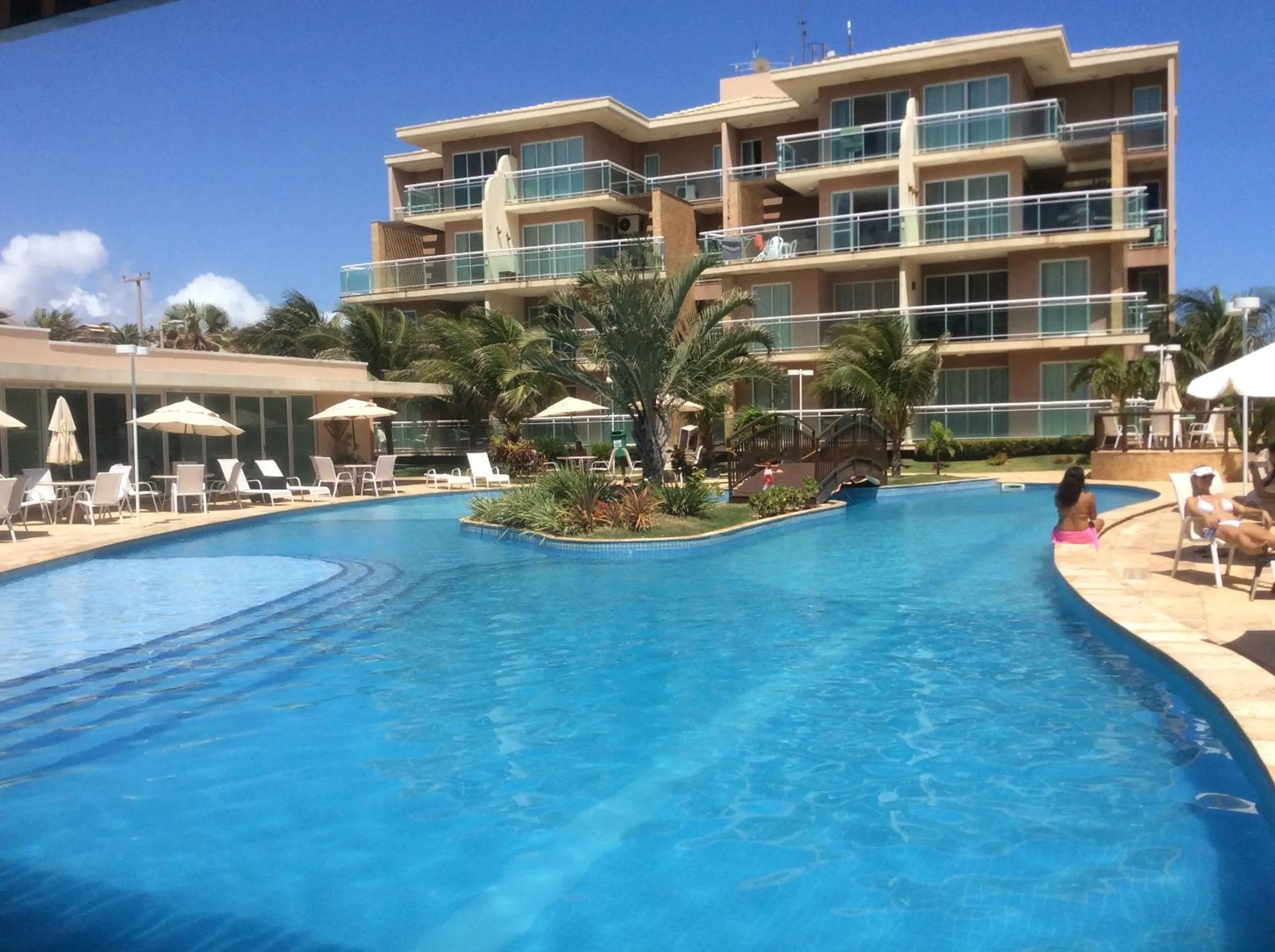 Pool view in Condomínio Palm Beach