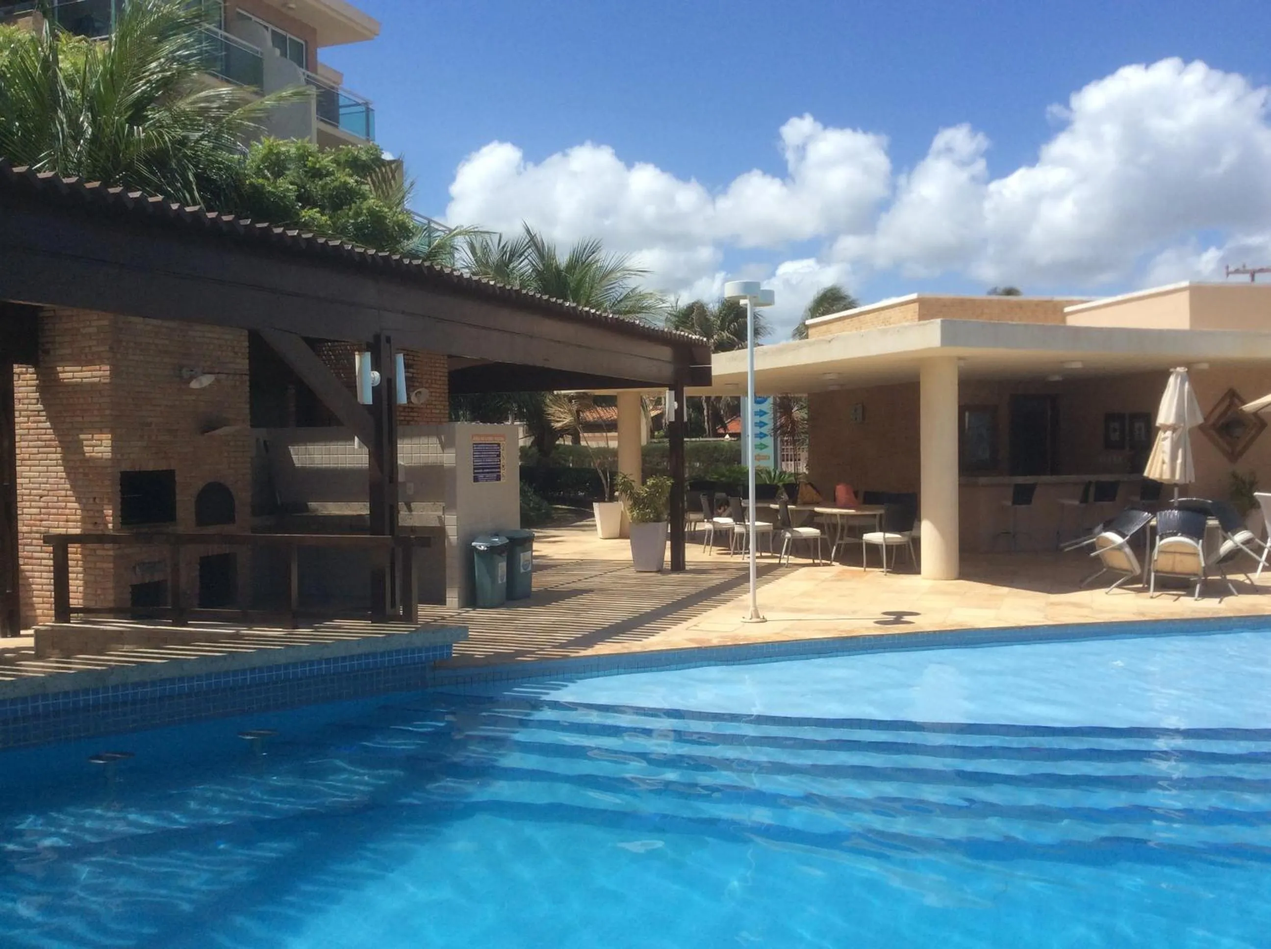 BBQ facilities in Condomínio Palm Beach