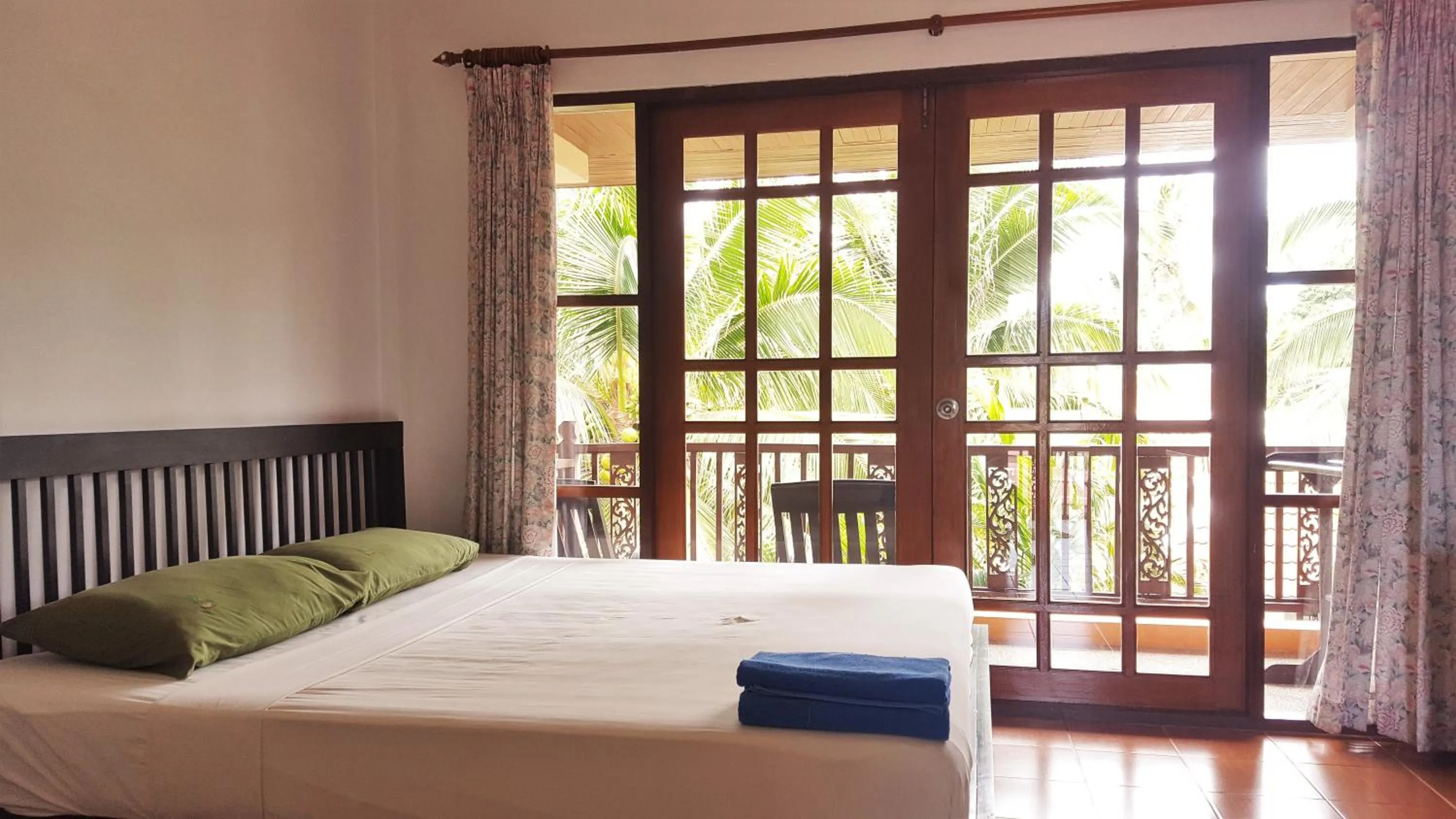 Bed in First Villa Beach Resort