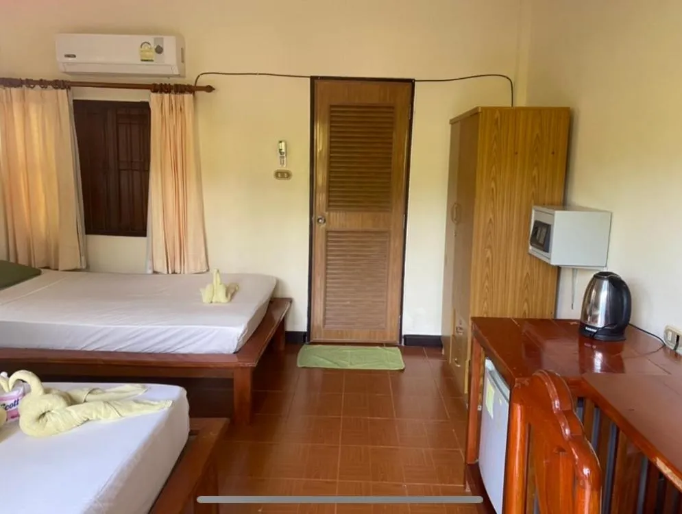 Bed in First Villa Beach Resort