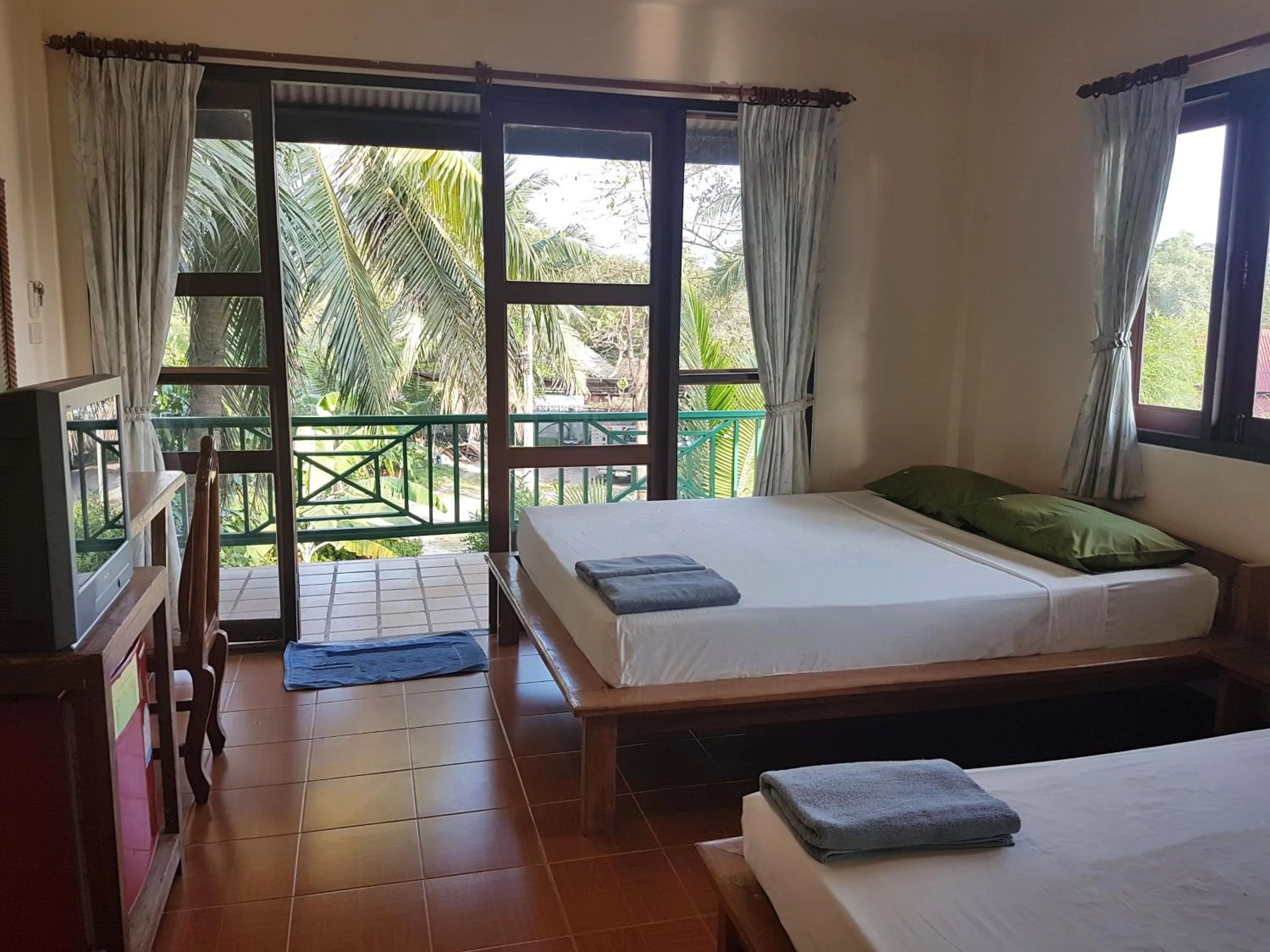 Bed in First Villa Beach Resort