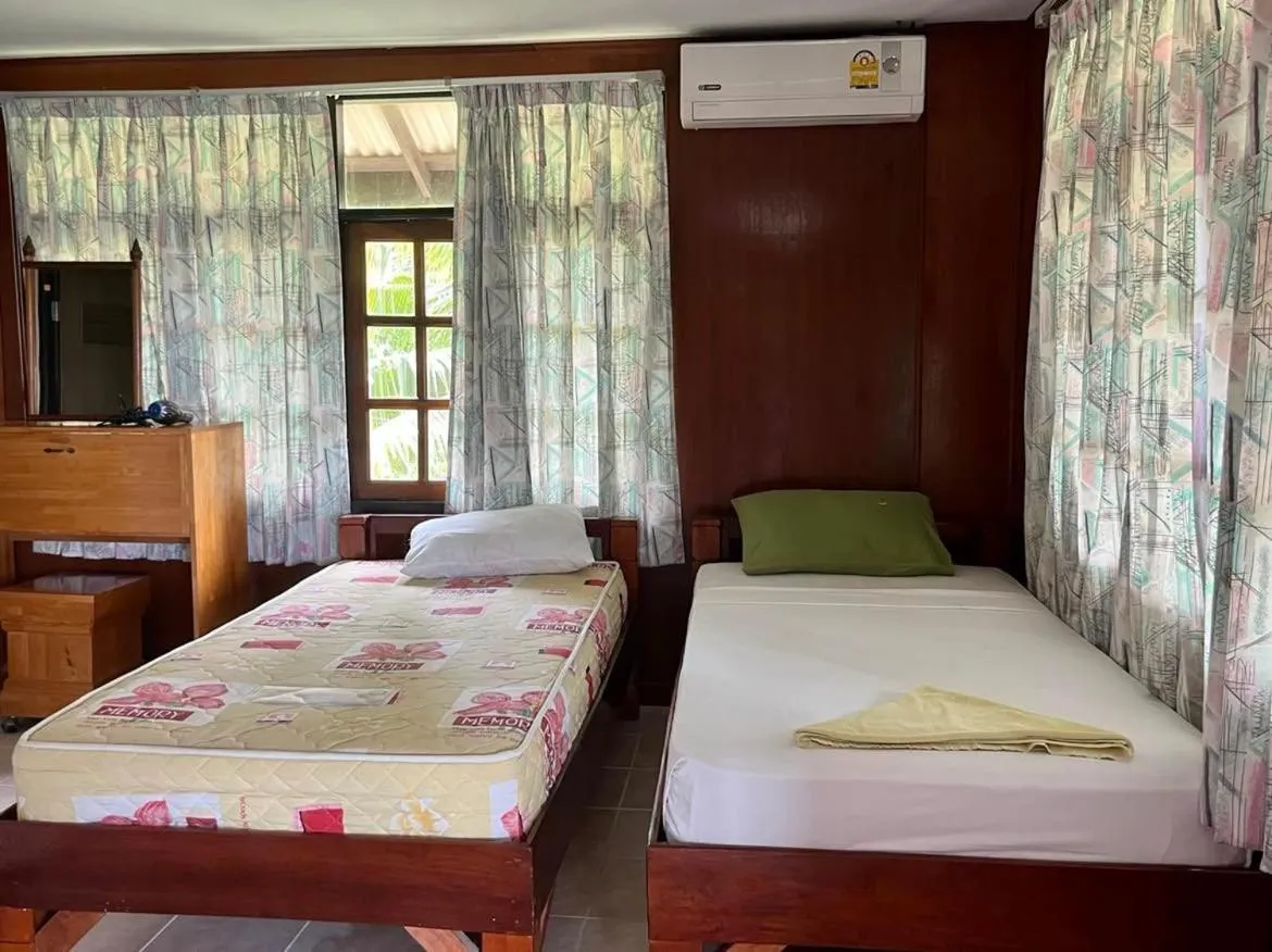 Bed in First Villa Beach Resort