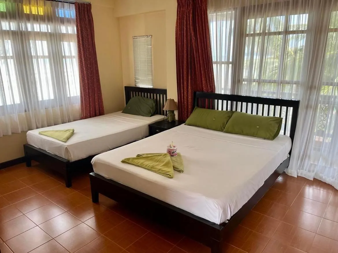 Bed in First Villa Beach Resort