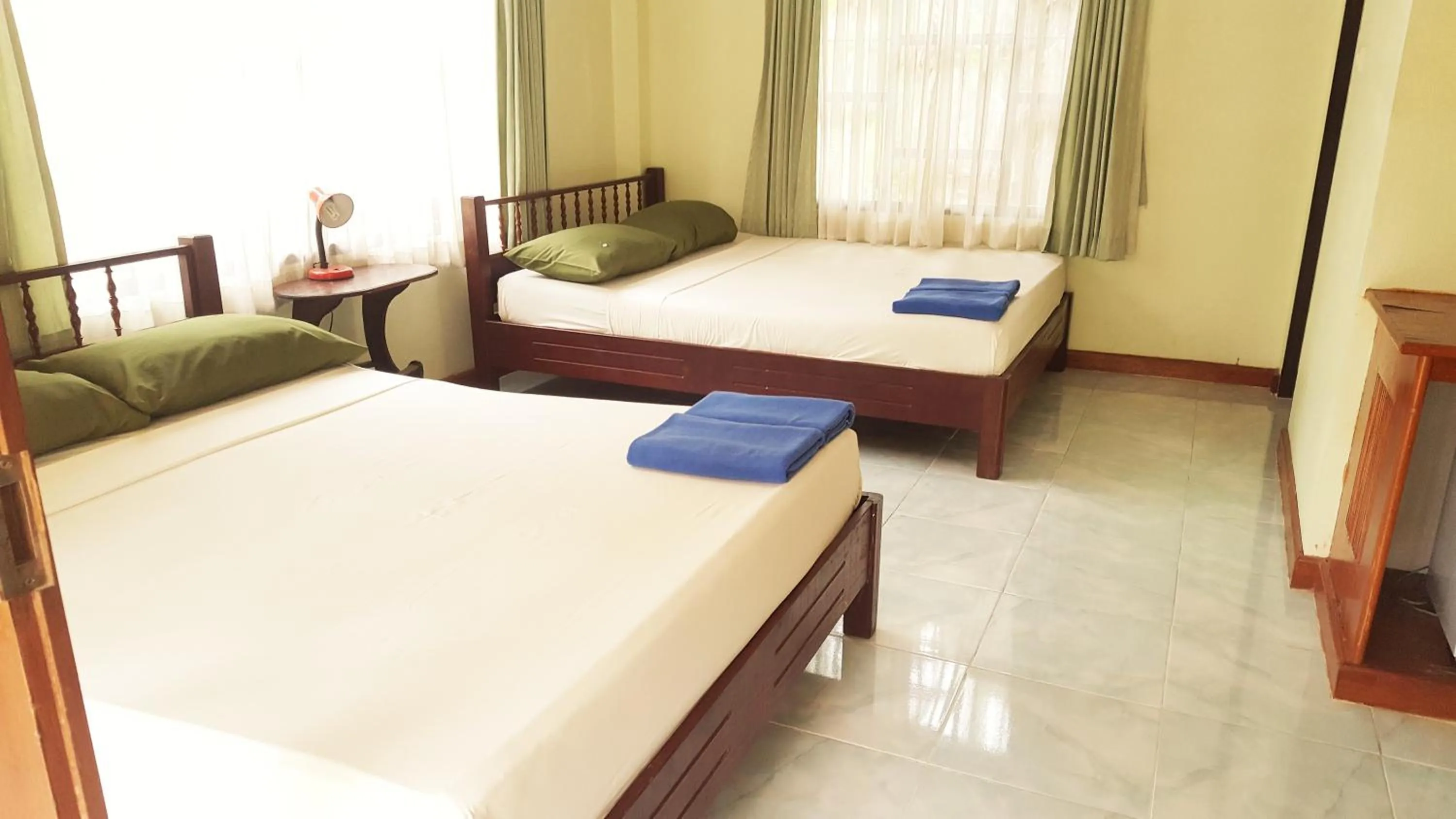 Bed in First Villa Beach Resort