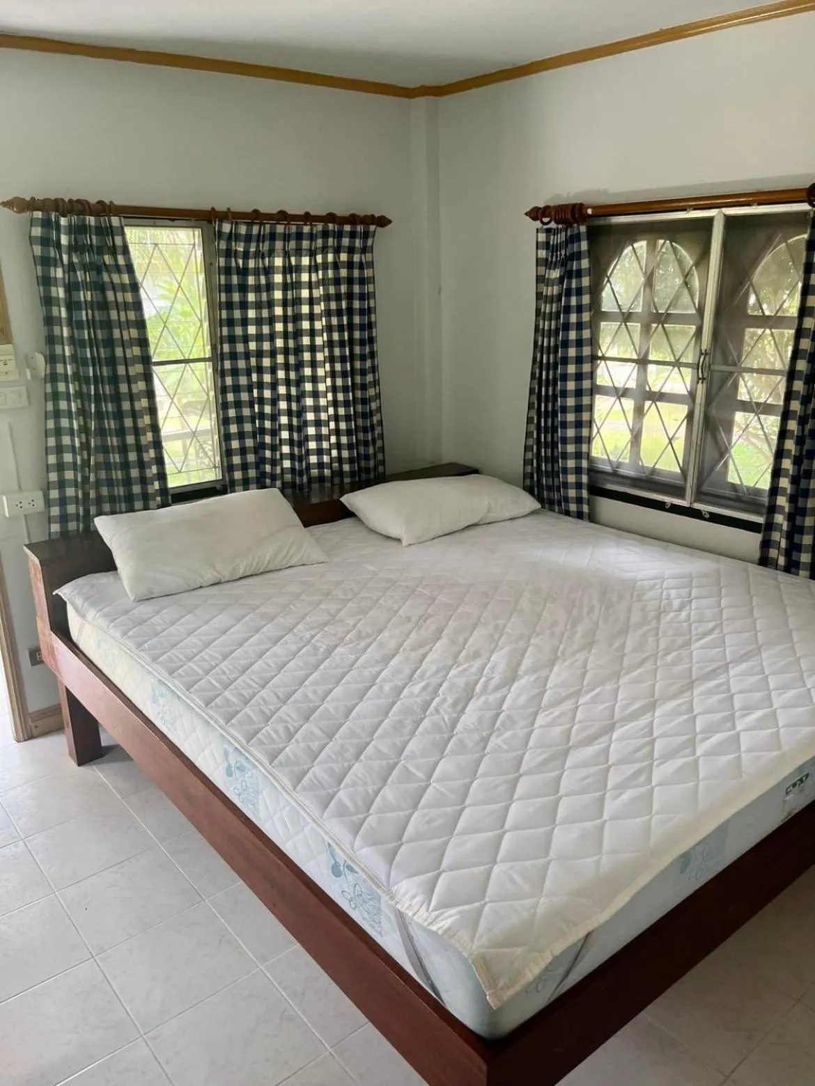 Bed in First Villa Beach Resort