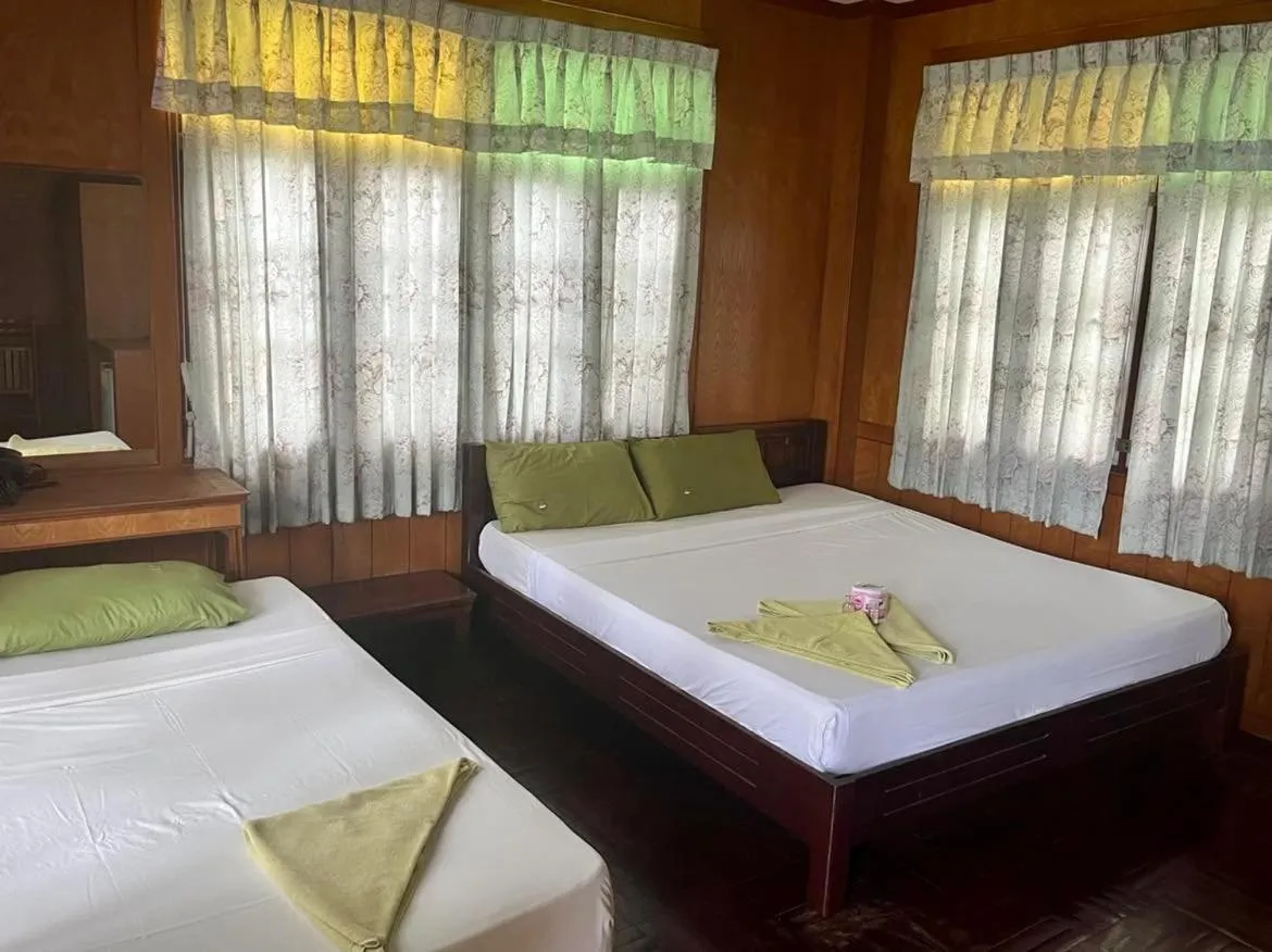 Bed in First Villa Beach Resort