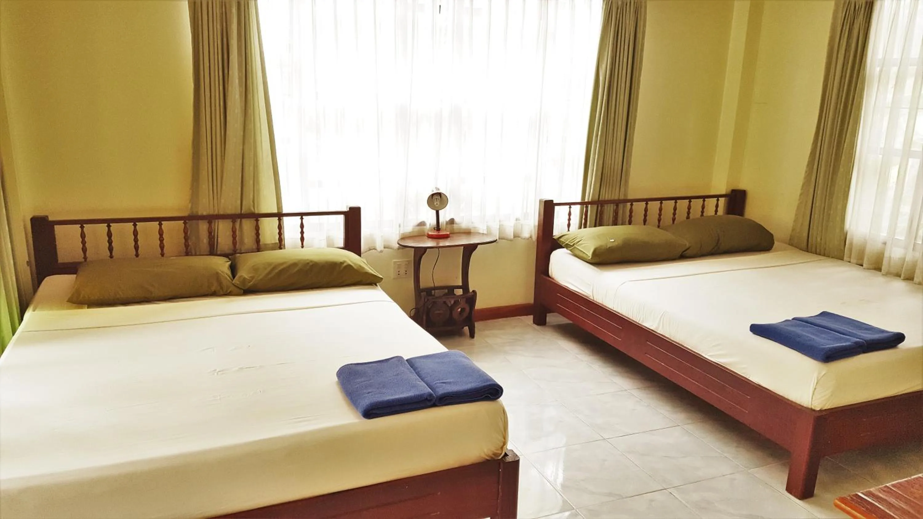 Bed in First Villa Beach Resort