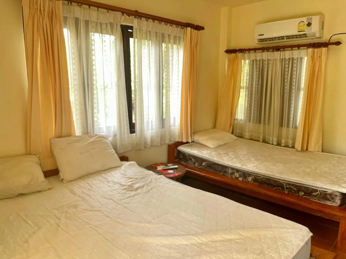 Bed in First Villa Beach Resort