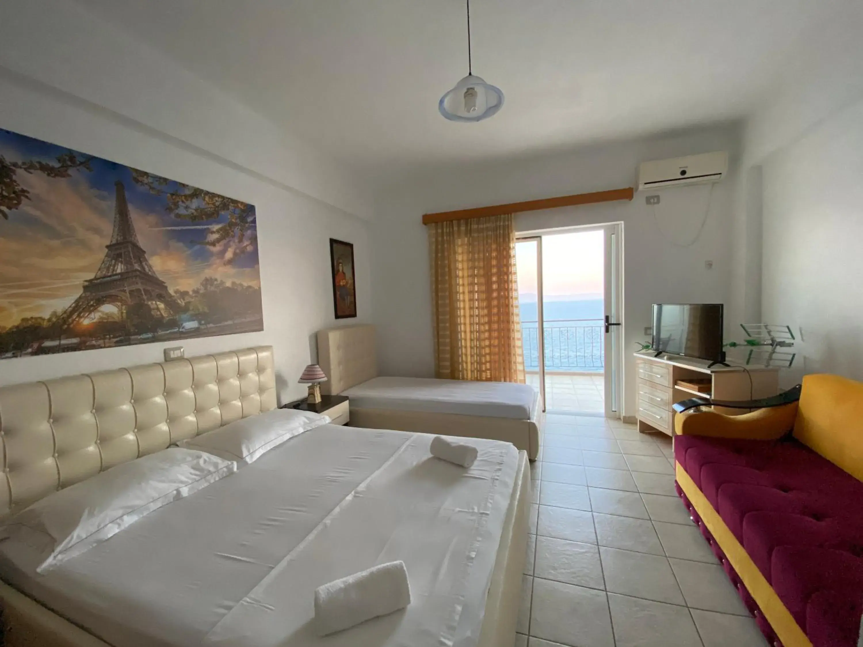 Standard Triple Room with Sea View in Hotel Odhisea Qeparo Standard Triple Room with Sea View in Hotel Odhisea Qeparo