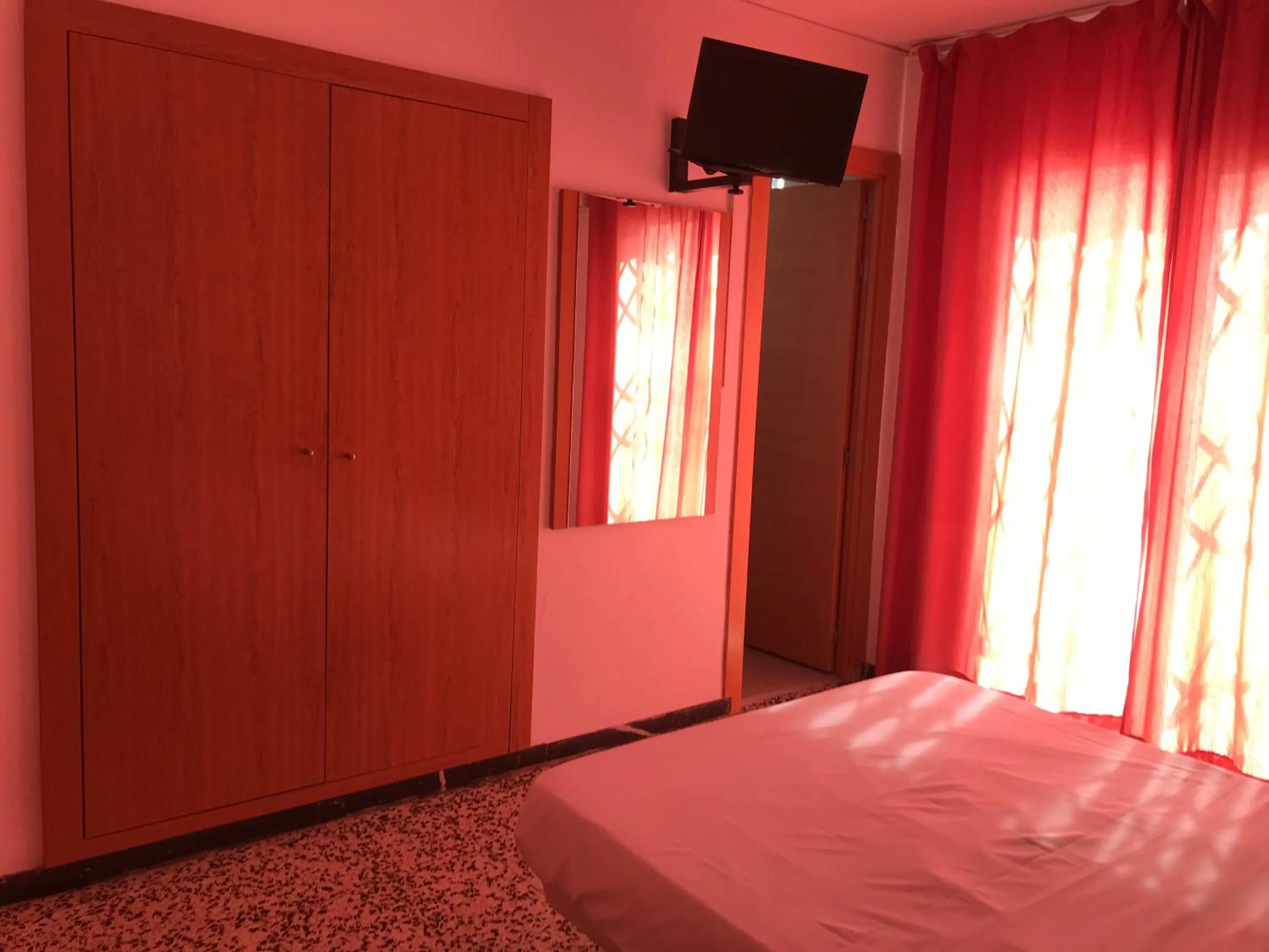 Bed in Hotel Iris