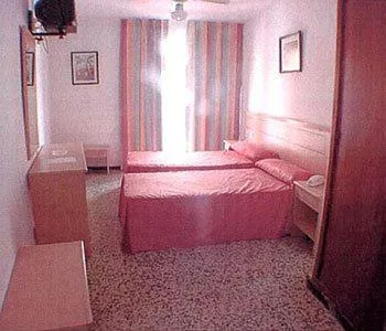 Bed in Hotel Iris