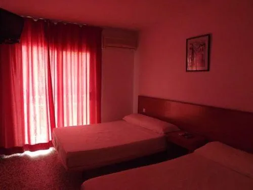 Bed in Hotel Iris