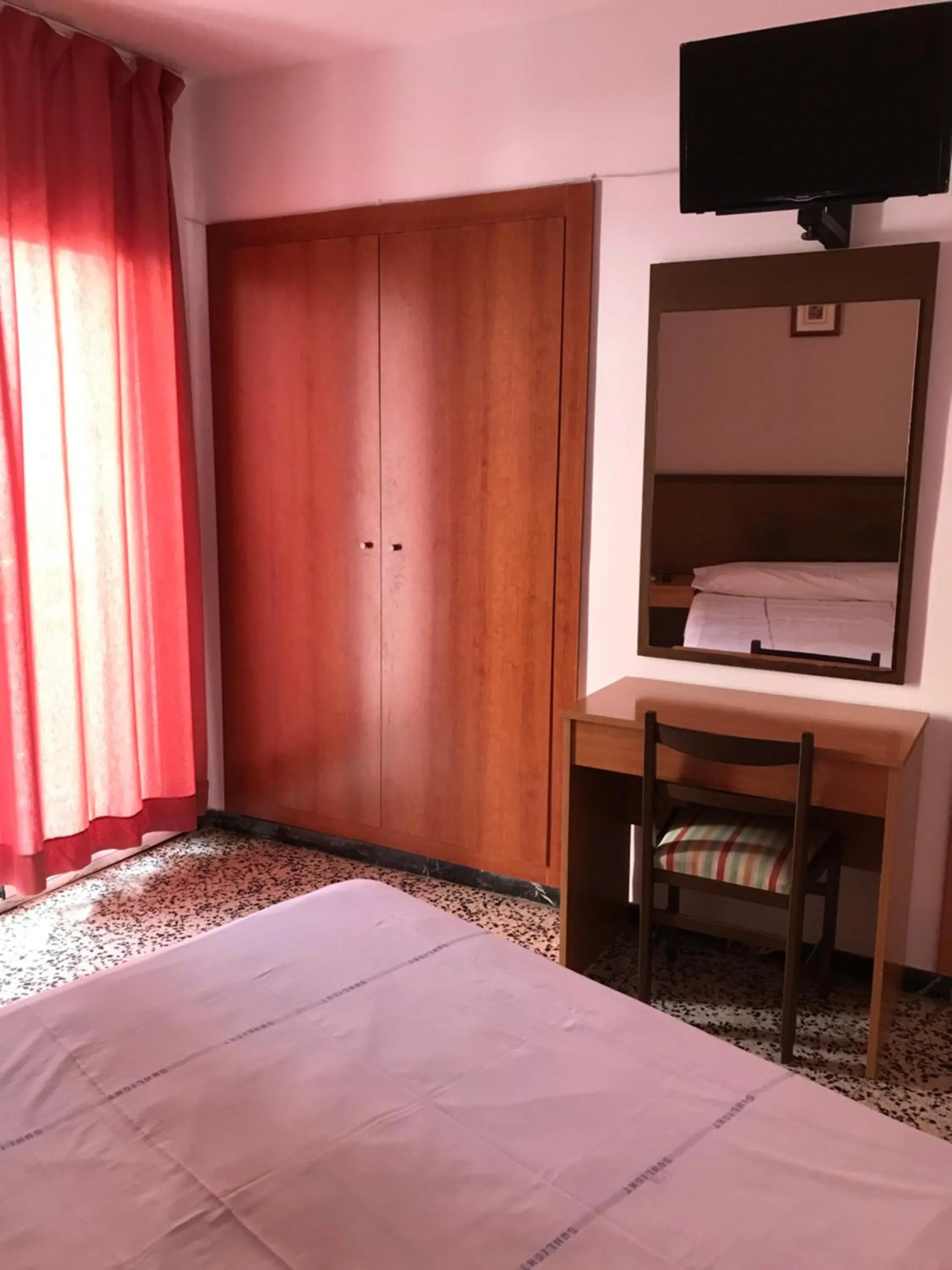 Bed in Hotel Iris