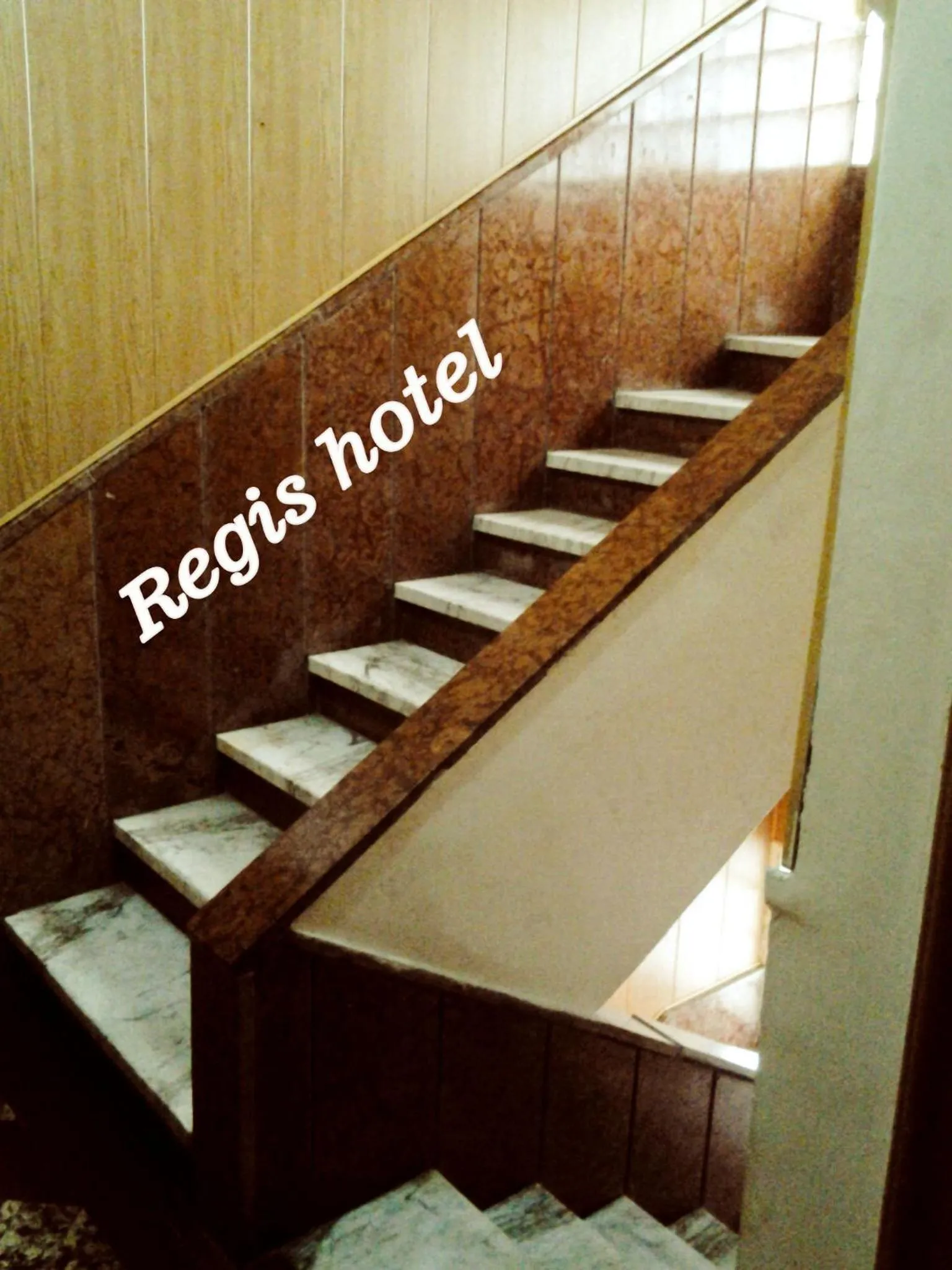 Property logo or sign in Regis Hotel