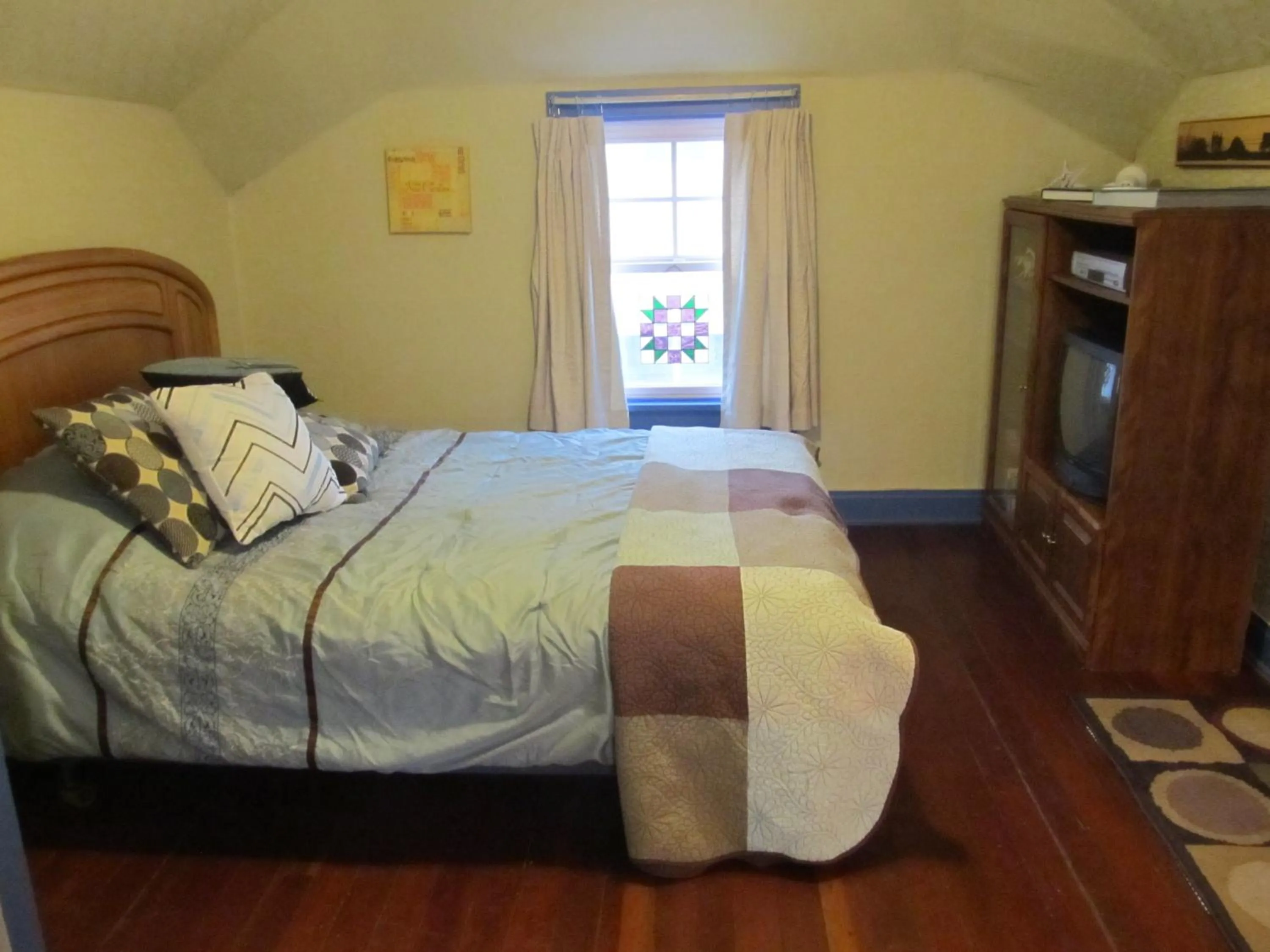 Bedroom, Bed in Covered By Faith Rentals -Storybook Home