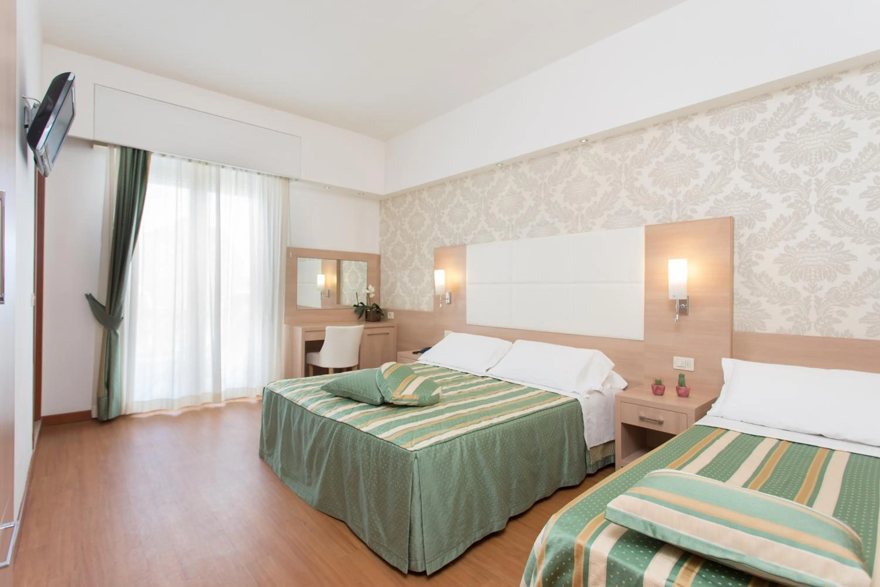 Photo of the whole room, Bed in Michelangelo Cesenatico