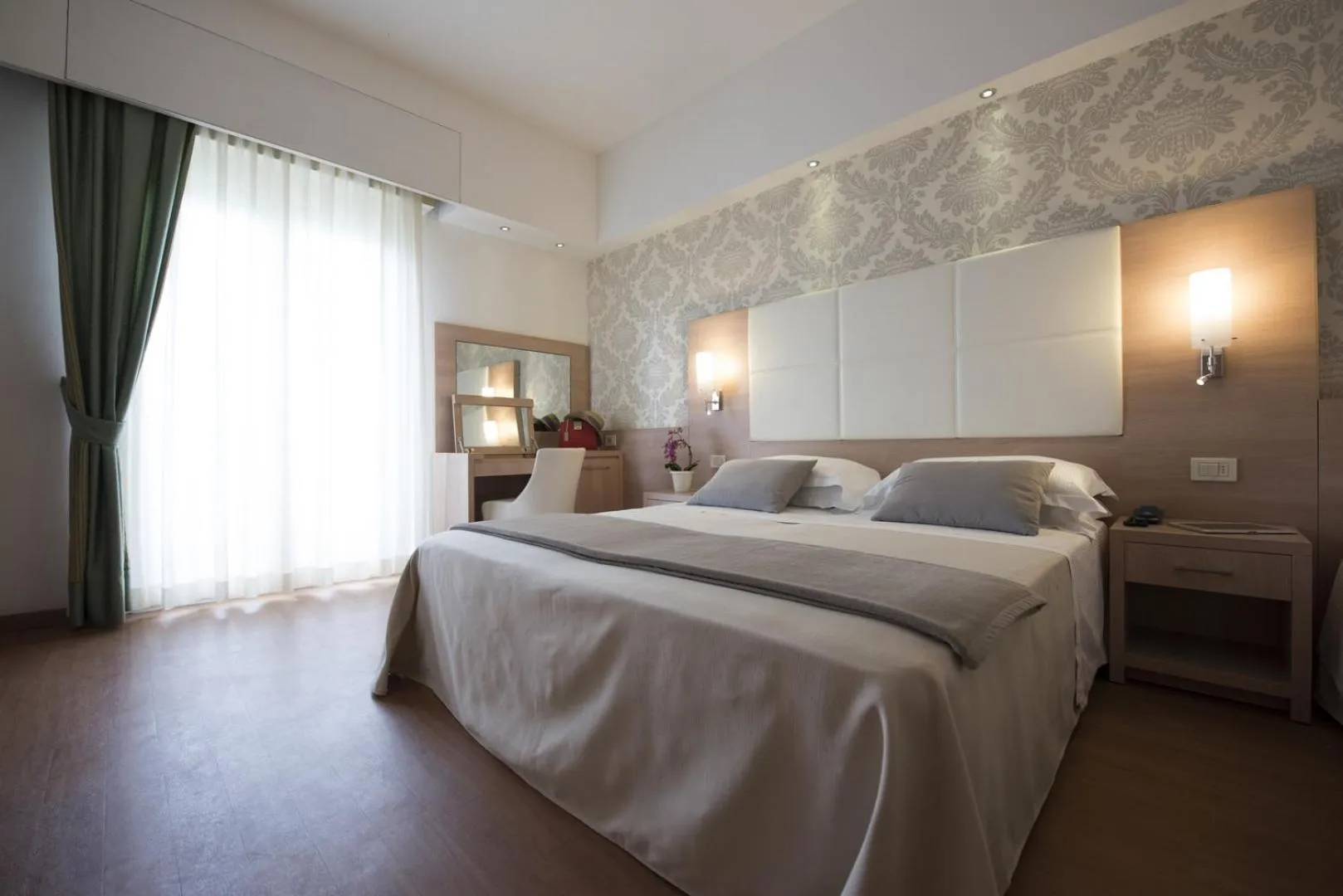 Photo of the whole room, Bed in Michelangelo Cesenatico