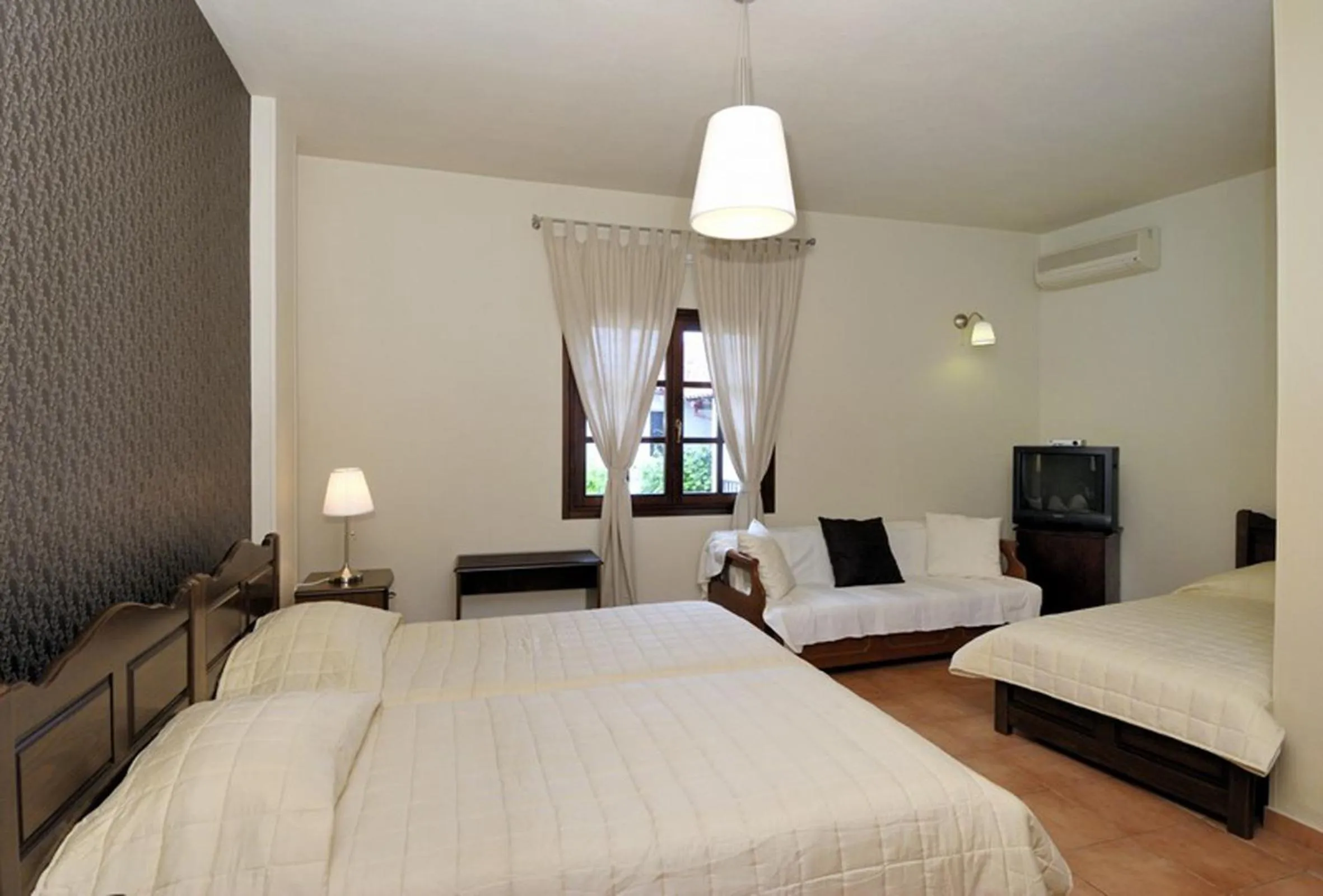 Bed in Enalion Hotel