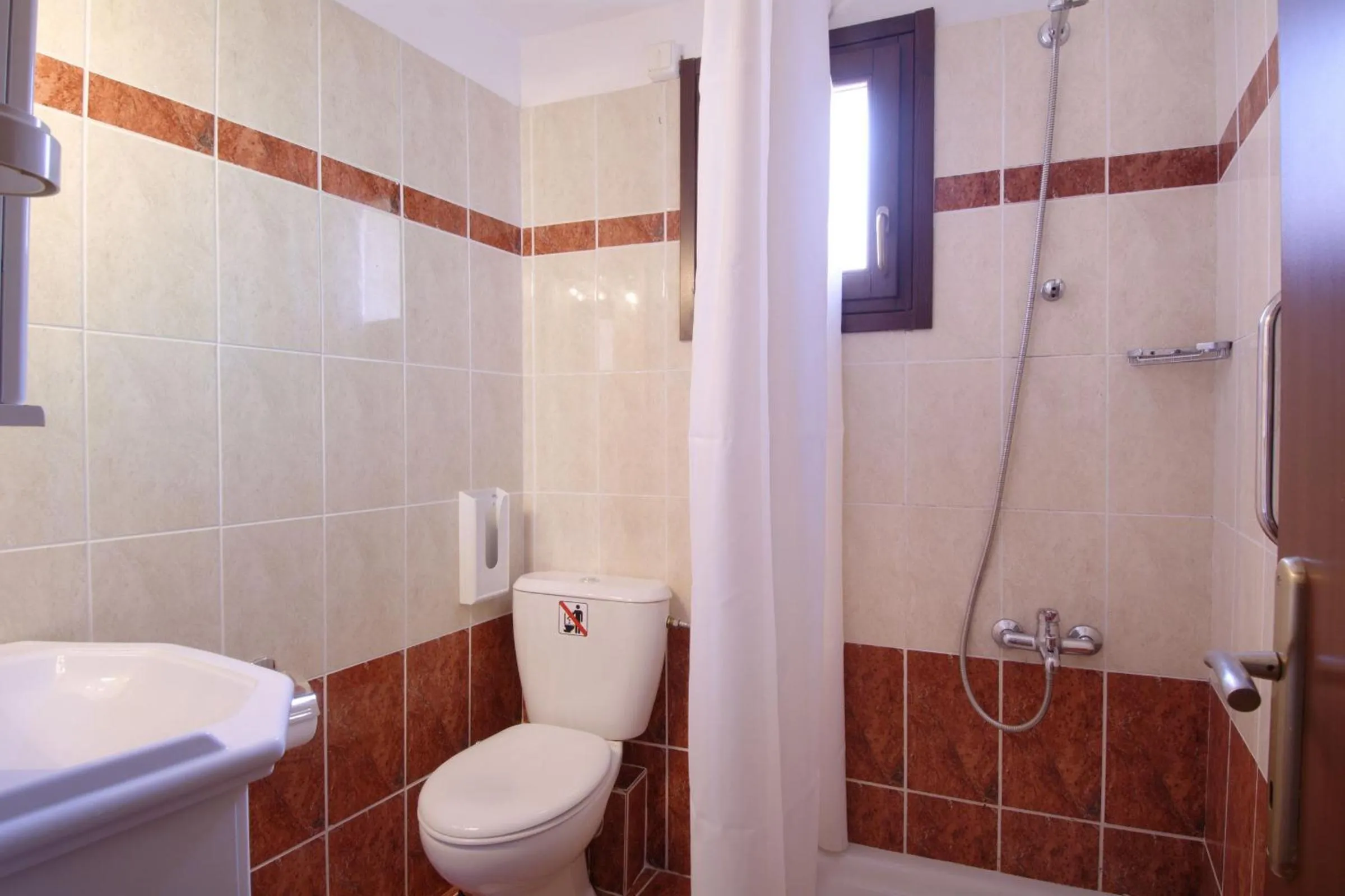 Bathroom in Enalion Hotel