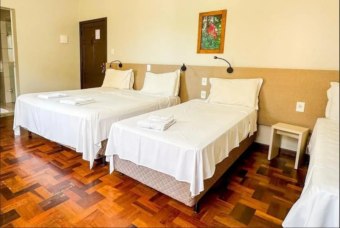 Bed in Pousada Casarão Schmidt