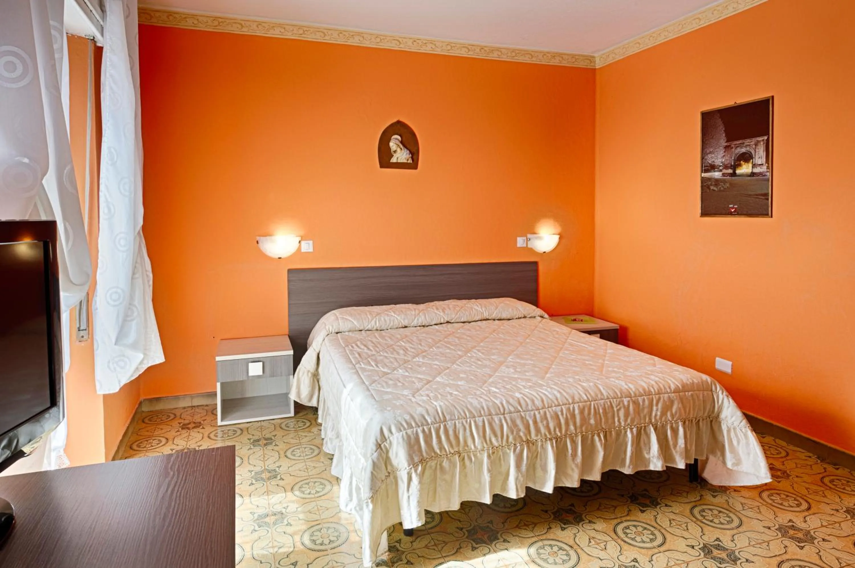 Bed in Albergo Mancuso del Voison