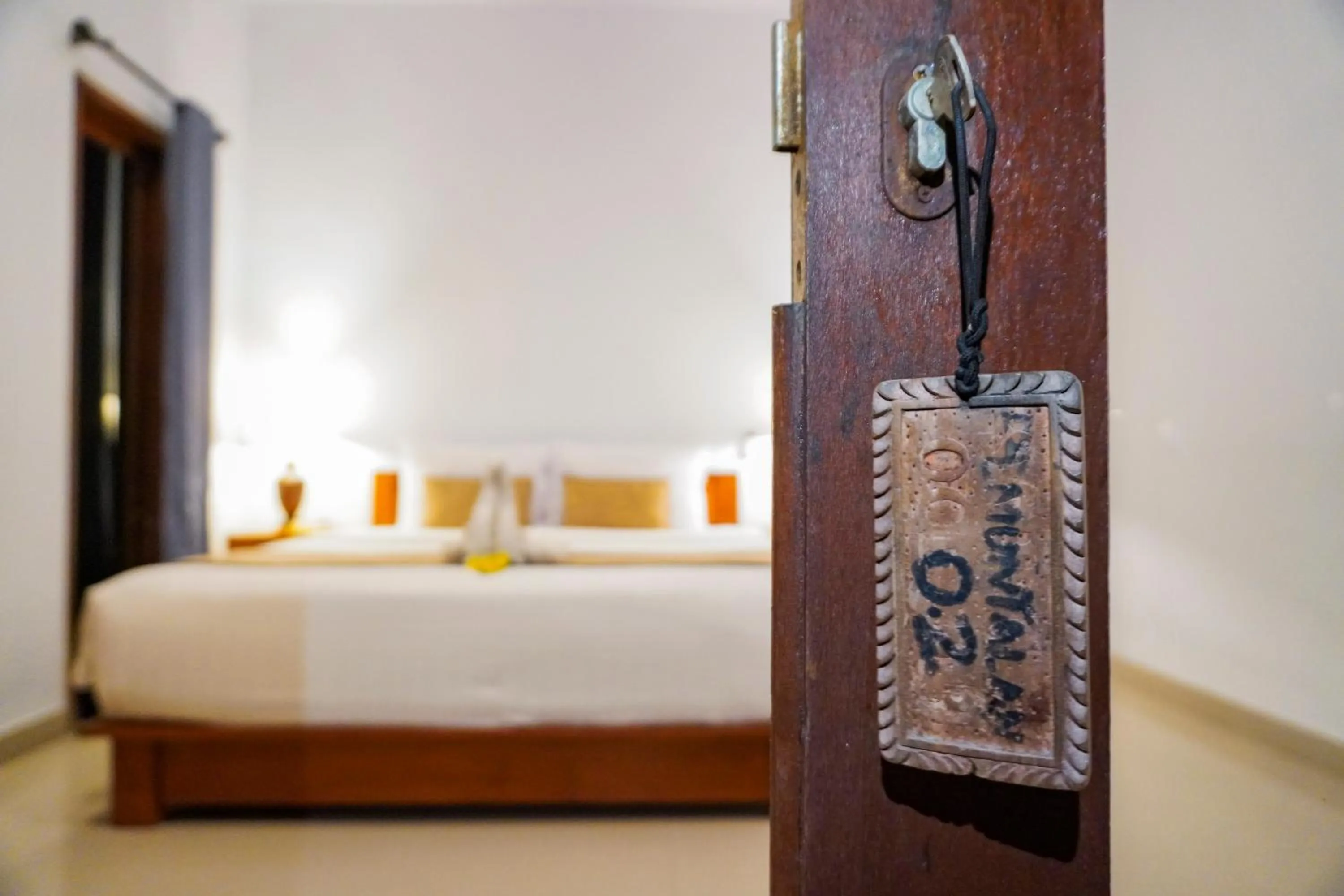 Property building, Bed in Pemuntalan Guesthouse