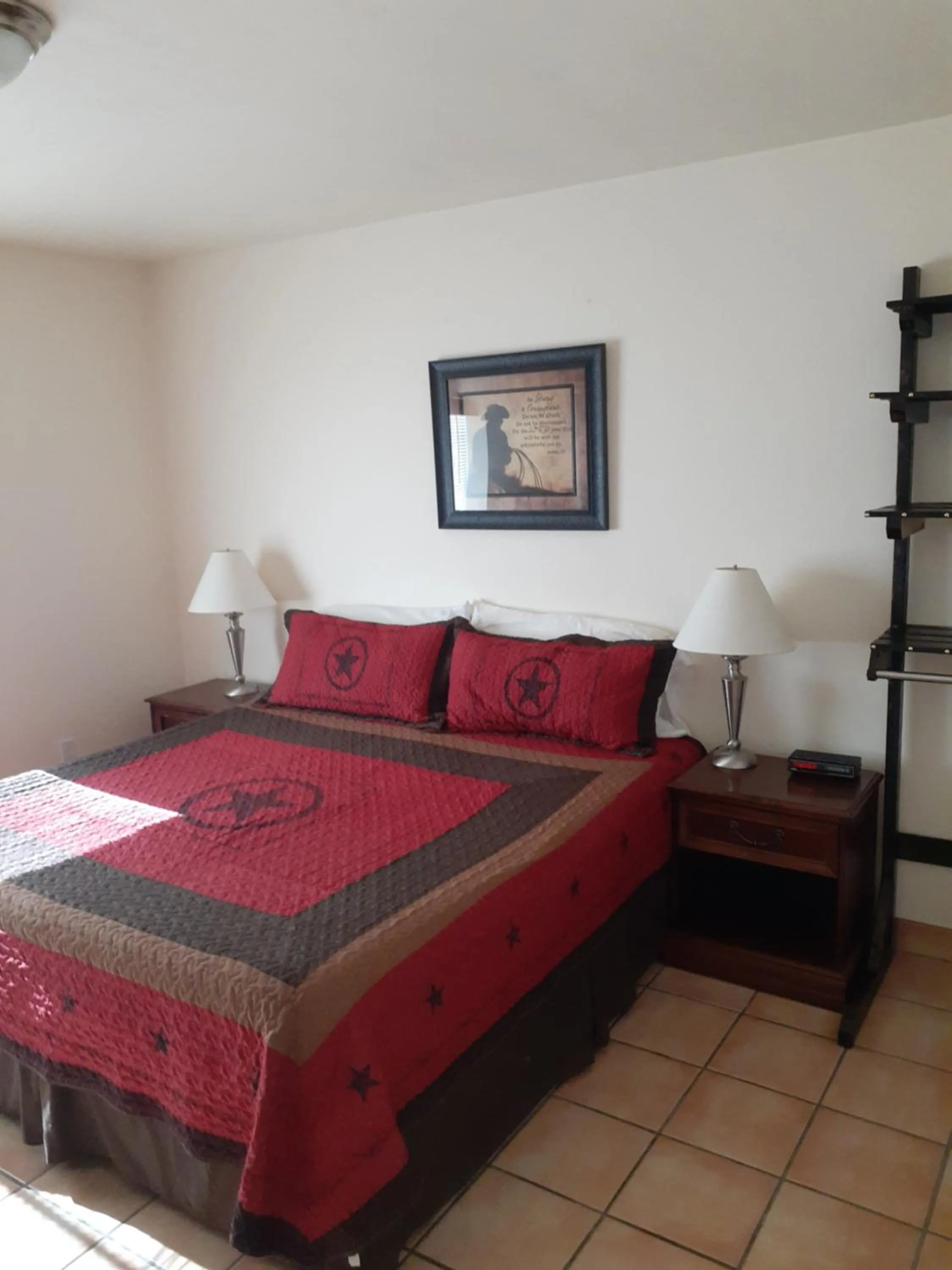 Bedroom in Stagecoach Suites