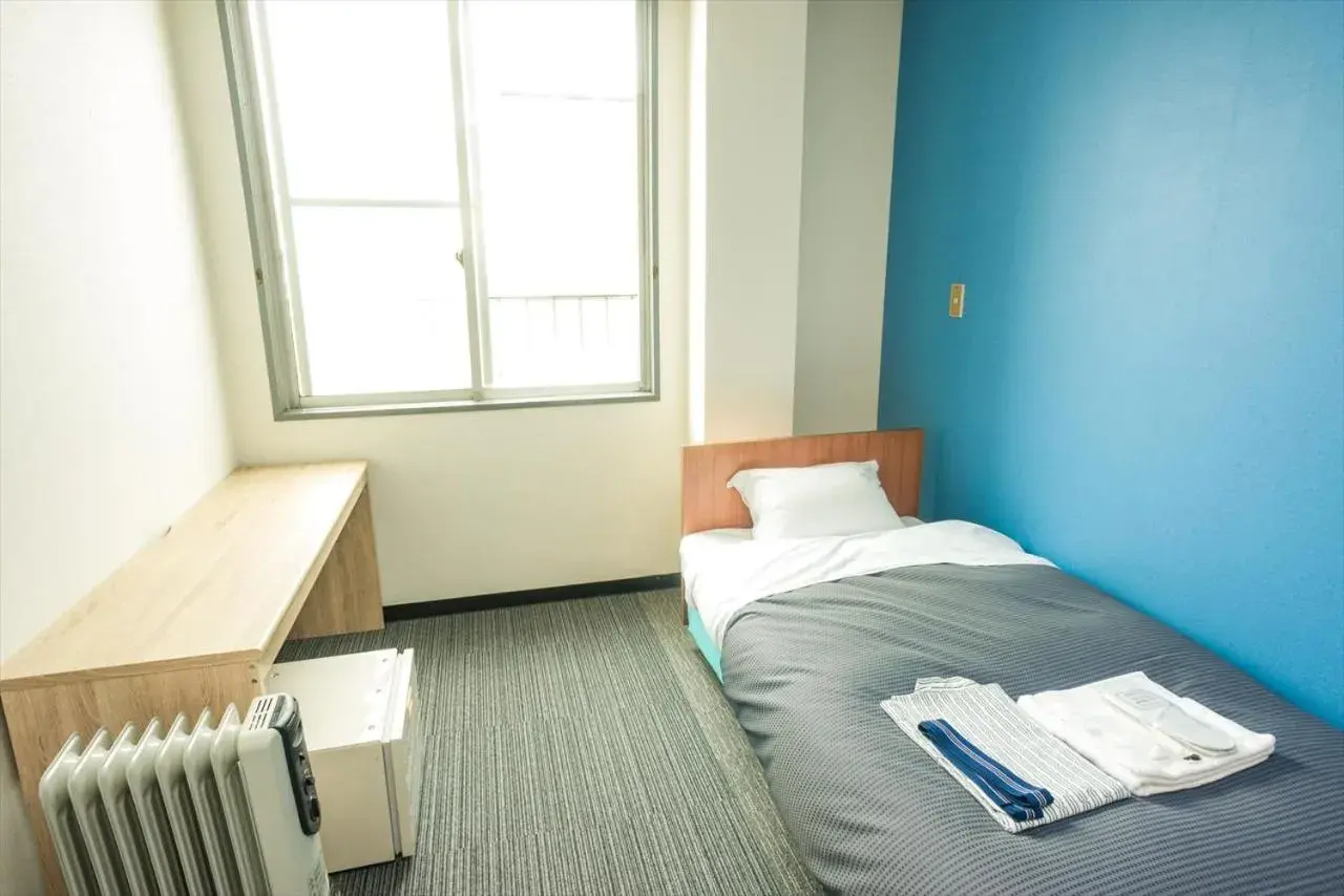 Bed in Hotel Ina Bed in Hotel Ina