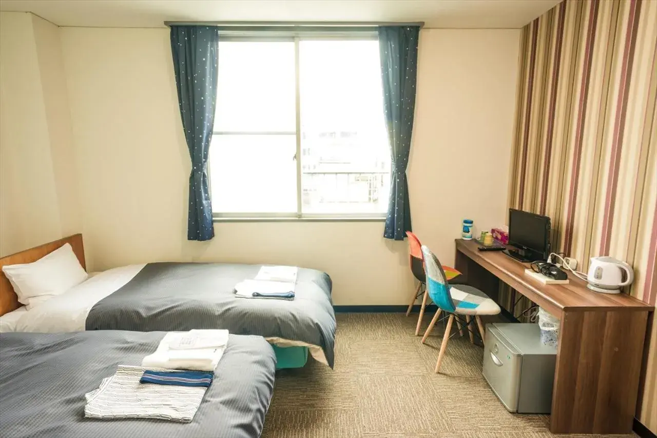 Bed in Hotel Ina Bed in Hotel Ina