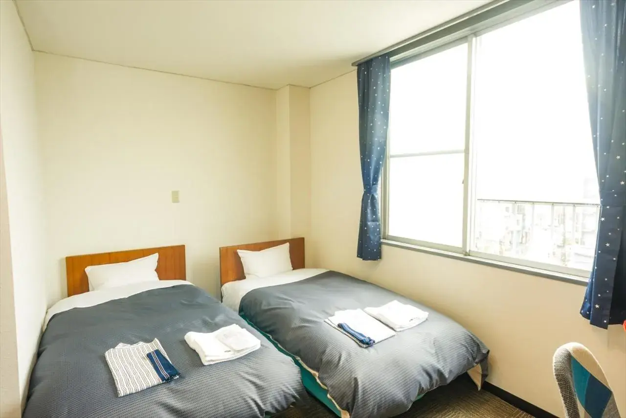 Bed in Hotel Ina Bed in Hotel Ina