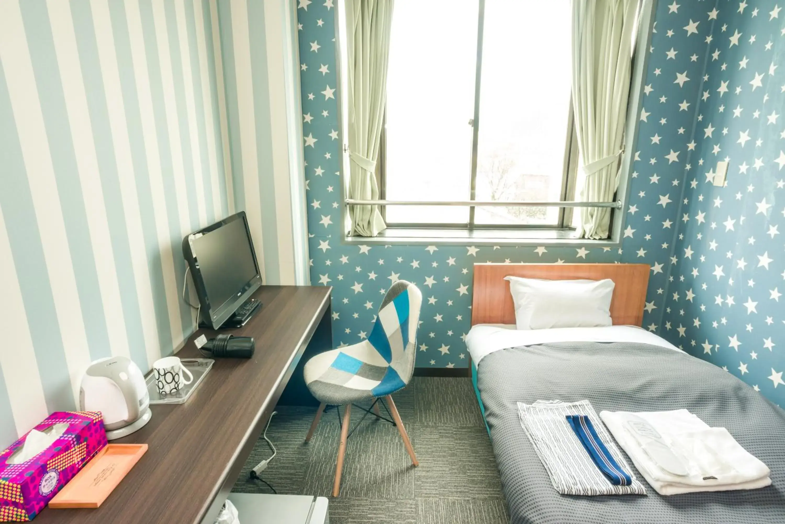 Bed in Hotel Ina Bed in Hotel Ina