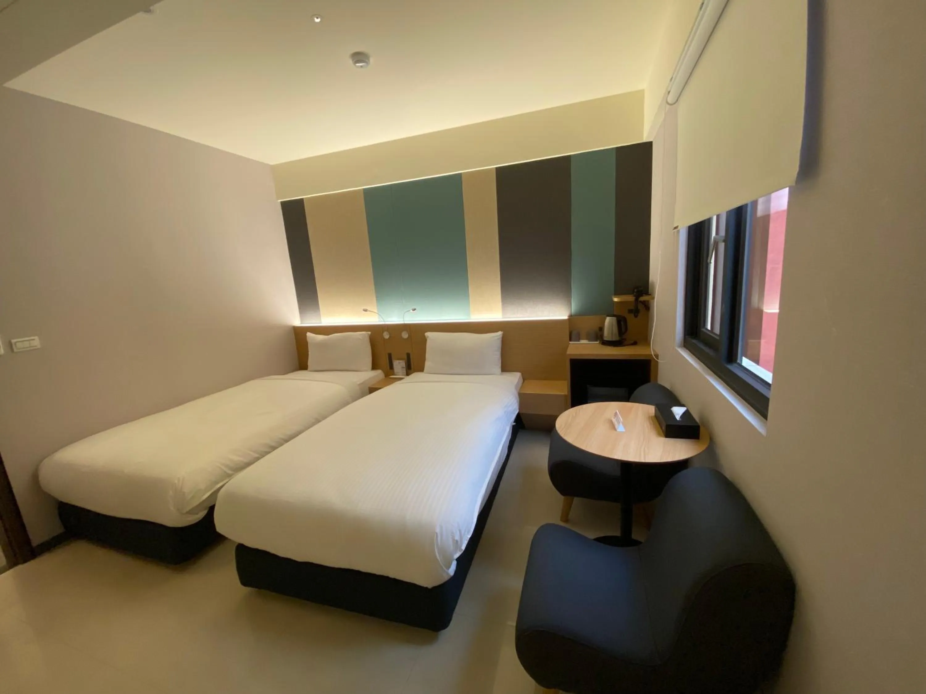 Photo of the whole room, Bed in Fu Kuang Hotel