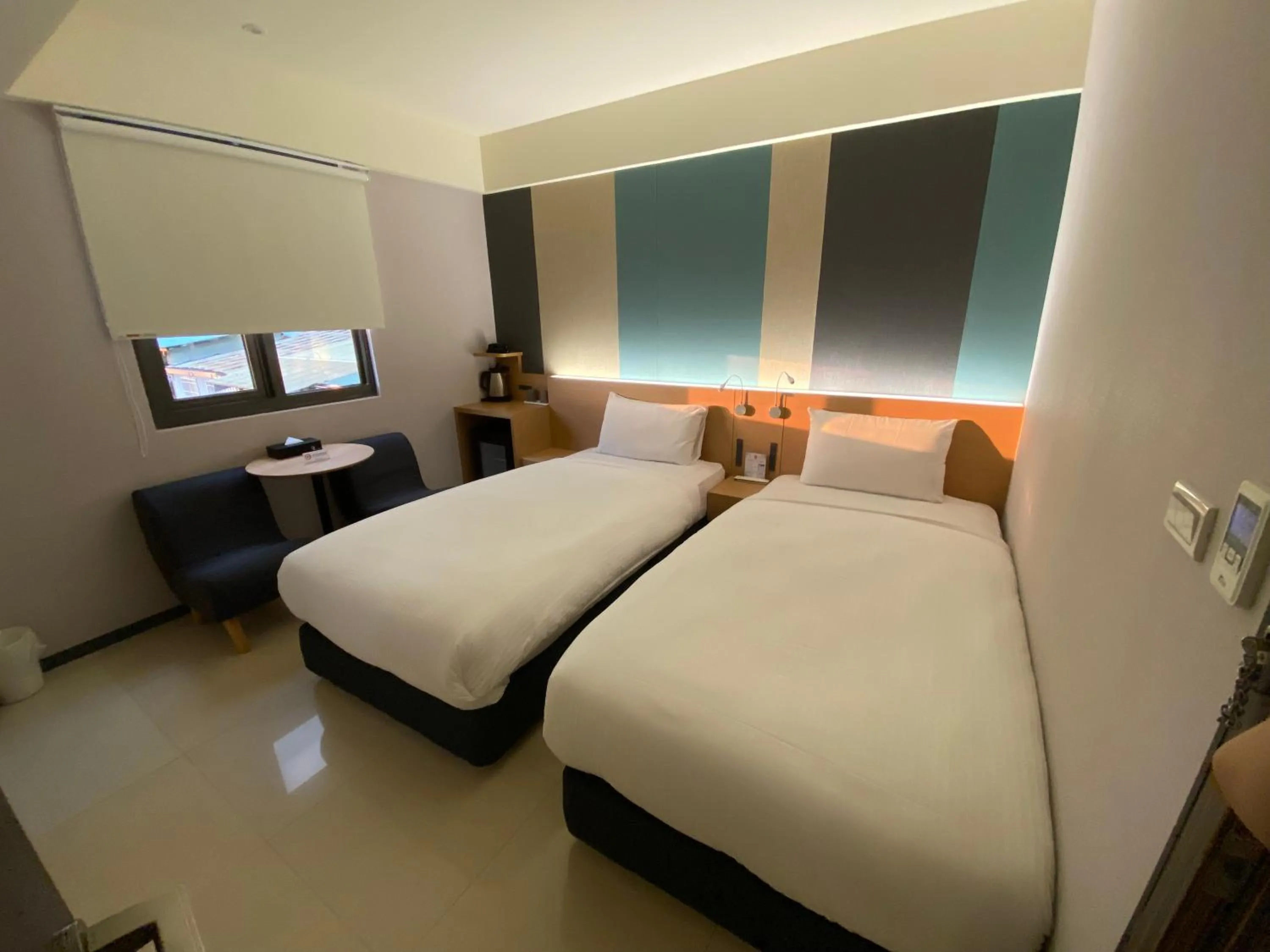 Photo of the whole room, Bed in Fu Kuang Hotel