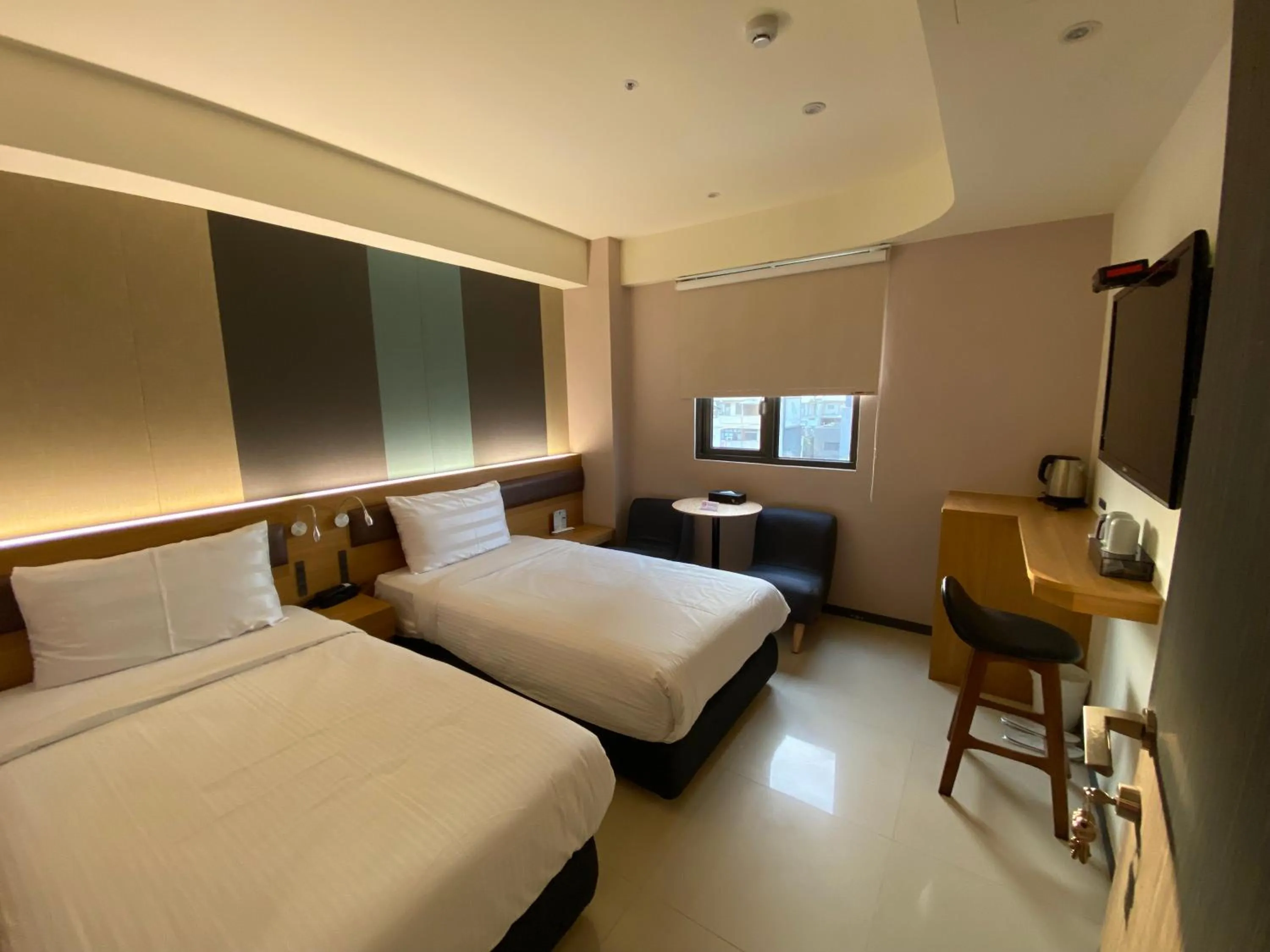 Photo of the whole room, Bed in Fu Kuang Hotel